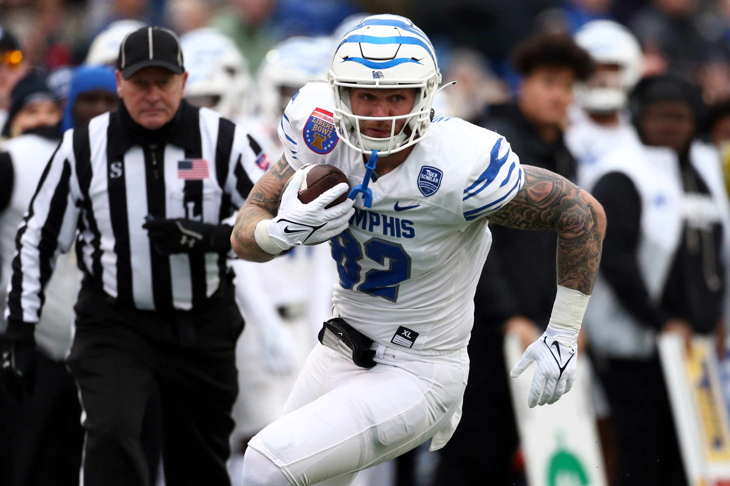 Dec 29, 2023; Memphis, TN, USA; Memphis Tigers tight end Anthony Landphere (82) runs after a catch during the first half against the Iowa State Cyclones at Simmons Bank Liberty Stadium.