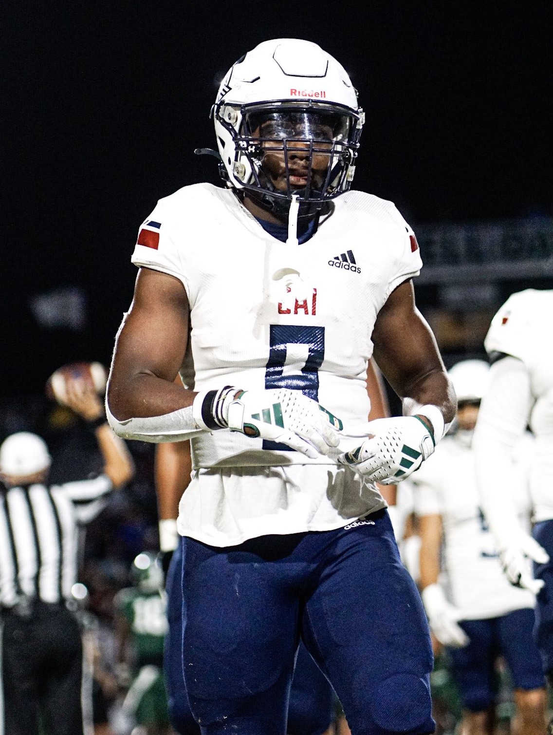 2025 3-star RB Antwan Raymond from Clearwater, Florida (Clearwater Academy International) standing on the field in between plays
