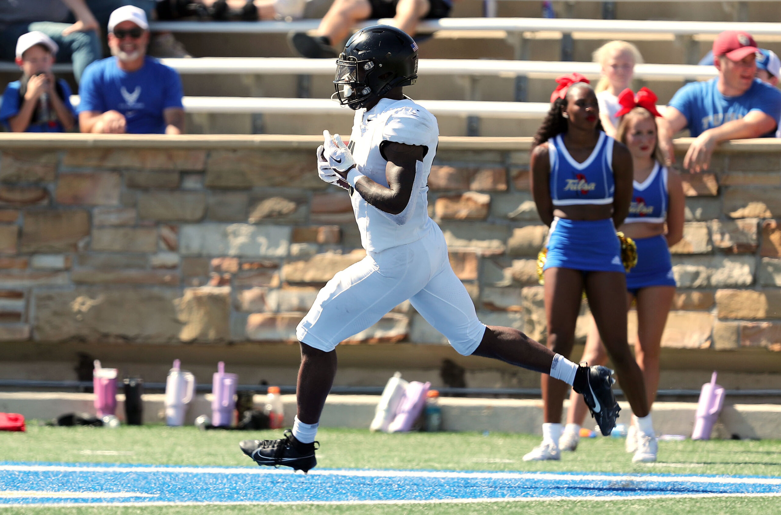Oct 5, 2024; Tulsa, Oklahoma, USA; Army Black Knights running back Kanye Udoh (6) runs for a touchdown against the Tulsa Golden Hurricane during the second half at Skelly Field at H.A. Chapman Stadium. 
