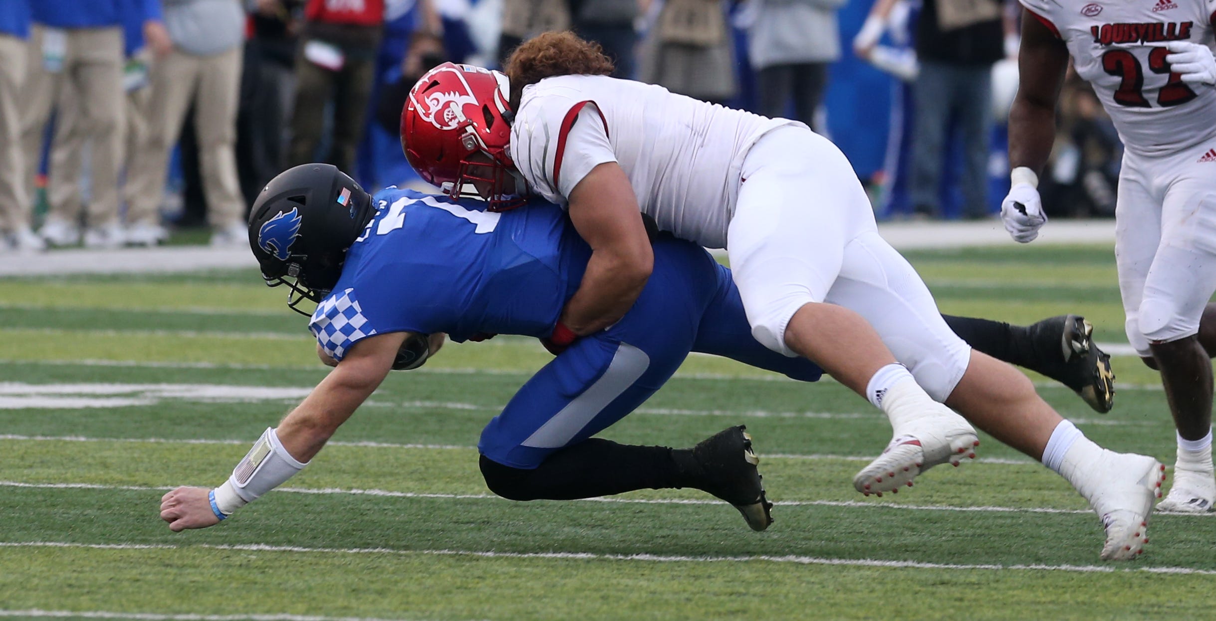 Louisville's Ashton Gillotte sacks Kentucky's Will Levis on Nov. 26, 2022