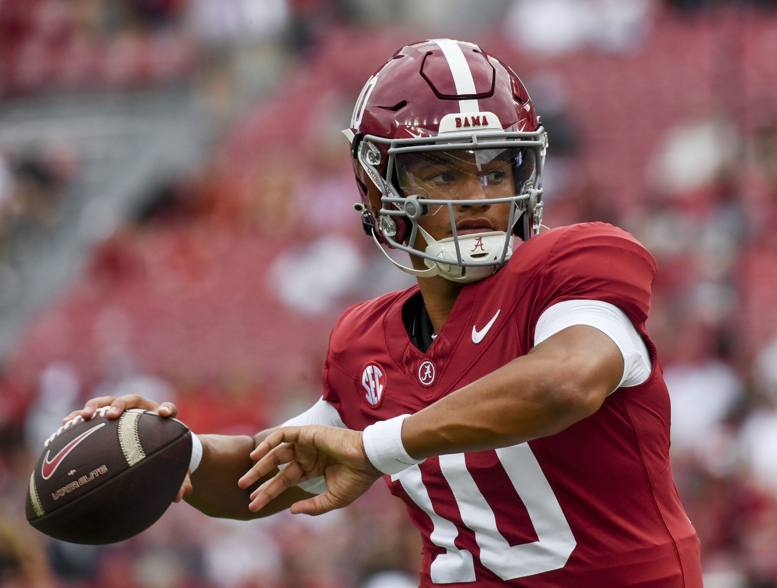 Sep 7, 2024; Tuscaloosa, Alabama, USA; Alabama Crimson Tide quarterback Austin Mack (10) warms up before a game against the South Florida Bulls at Bryant-Denny Stadium.