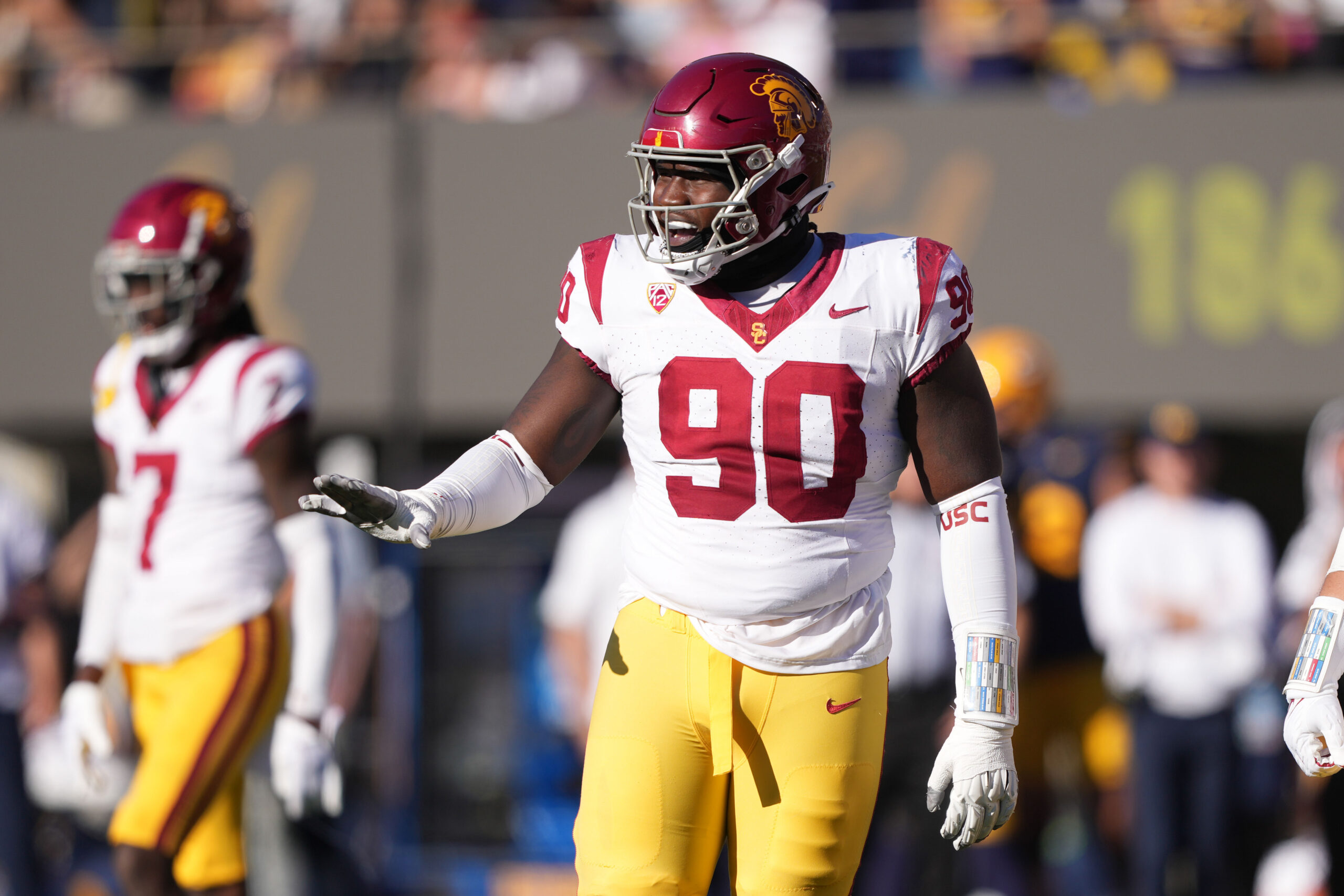 Oct 28, 2023; Berkeley, California, USA; USC Trojans defensive lineman Bear Alexander (90) gestures during the third quarter against the California Golden Bears at California Memorial Stadium.