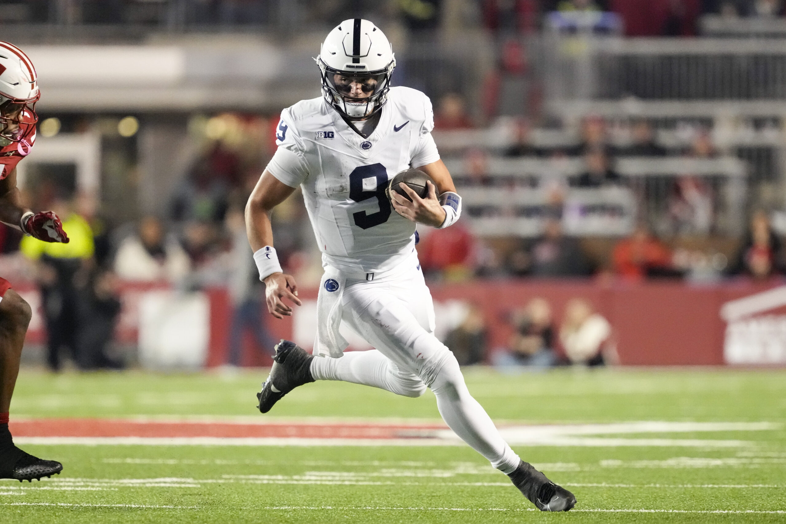 Oct 26, 2024; Madison, Wisconsin, USA; Penn State Nittany Lions quarterback Beau Pribula (9) rushes with the football during the fourth quarter against the Wisconsin Badgers at Camp Randall Stadium.