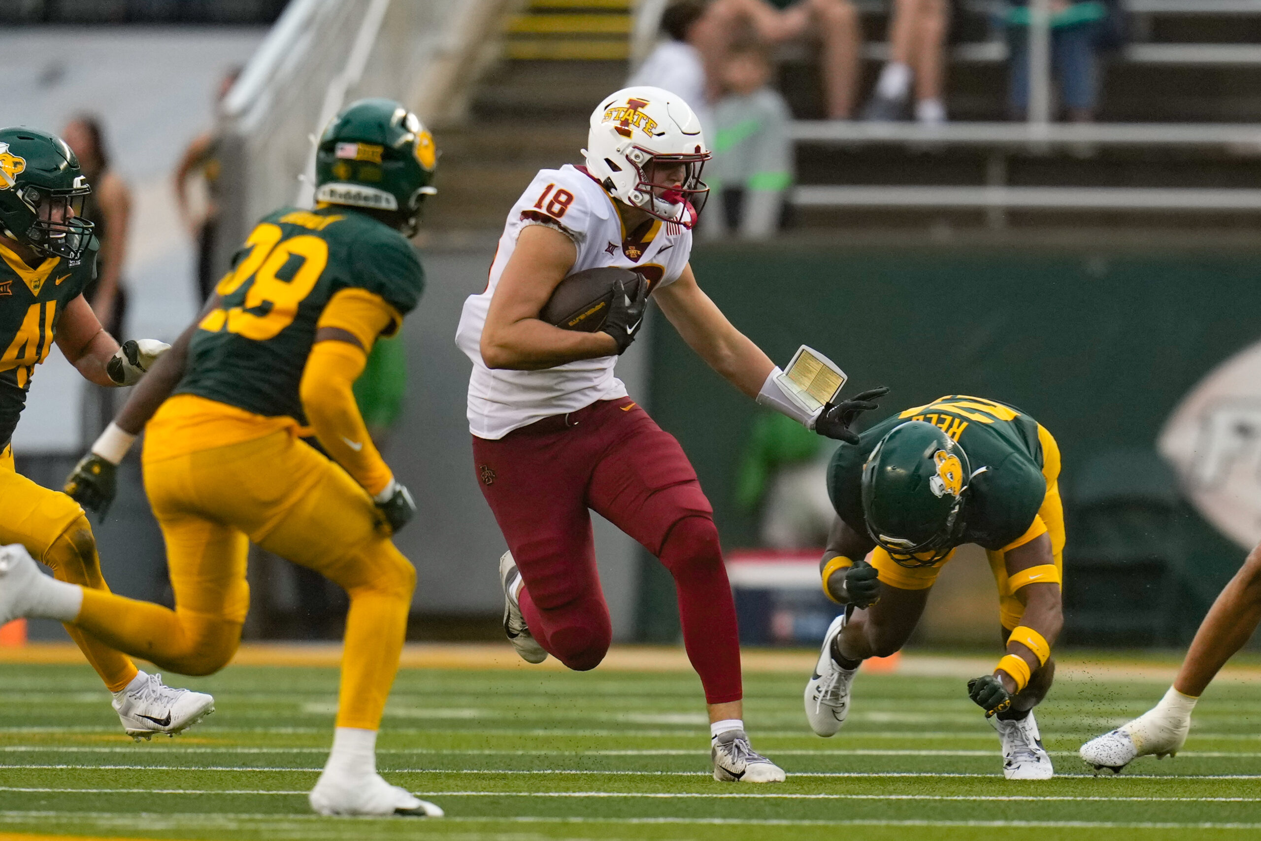 Oct 28, 2023; Waco, Texas, USA; Iowa State Cyclones tight end Benjamin Brahmer (18) is tackled by Baylor Bears safety Devyn Bobby (28) after a catch during the second half at McLane Stadium.