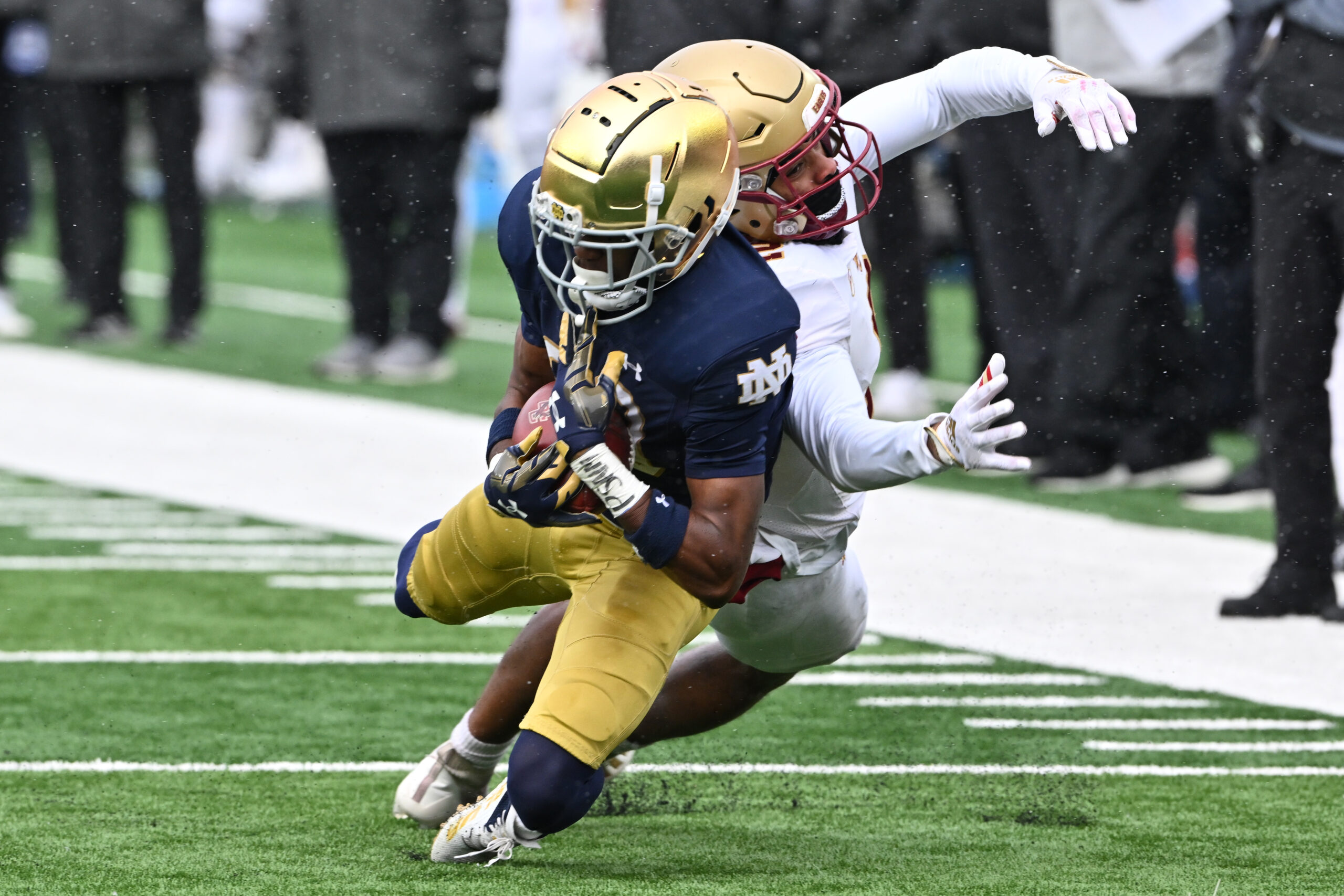 Nov 19, 2022; South Bend, Indiana, USA; Notre Dame Fighting Irish cornerback Benjamin Morrison (20) intercepts a pass intended for Boston College Eagles wide receiver Joseph Griffin (2) in the first quarter at Notre Dame Stadium.