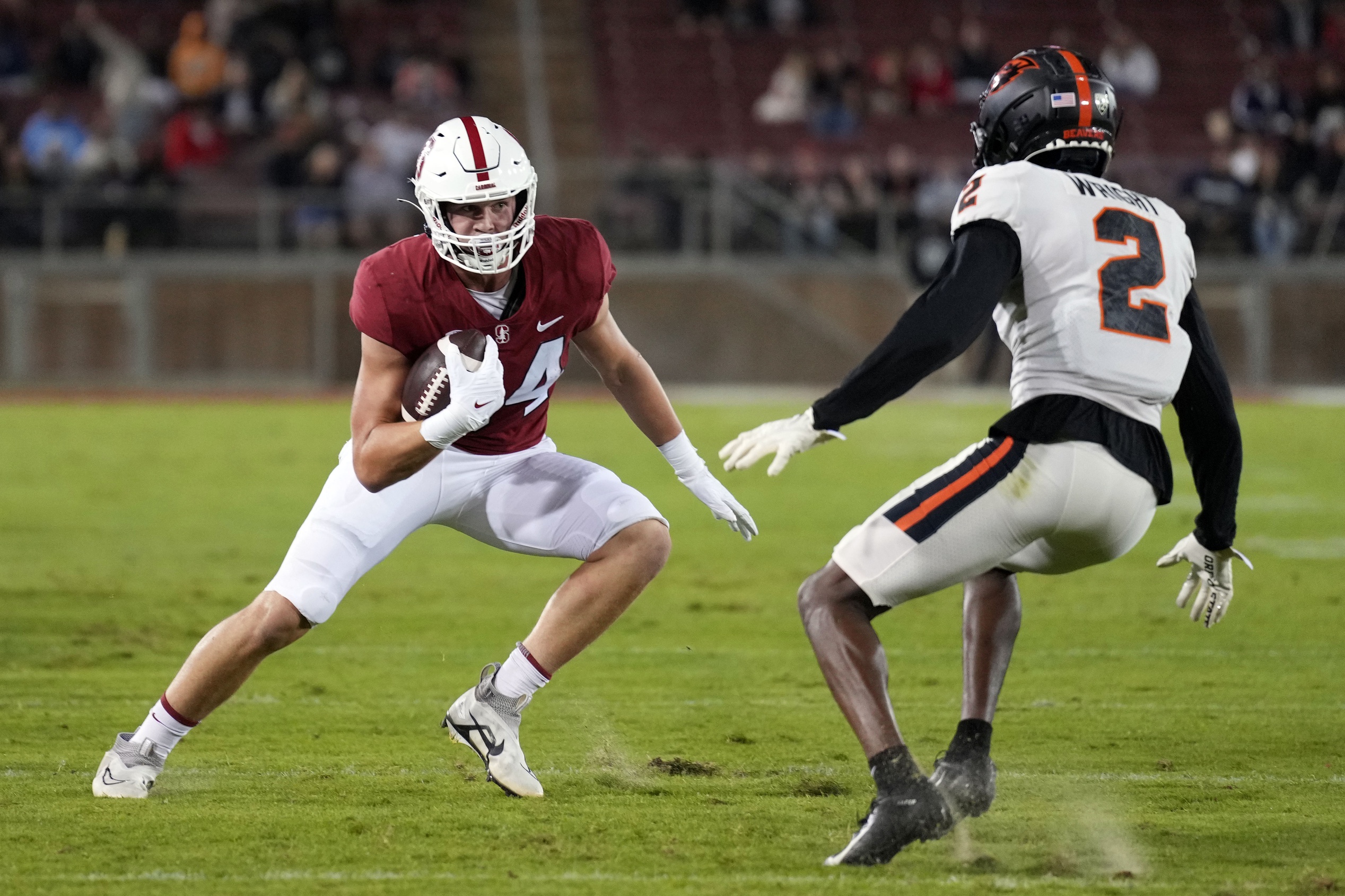 Oct 8, 2022; Stanford, California, USA; Stanford Cardinal tight end Benjamin Yurosek (84) runs after a catch against Oregon State Beavers defensive back Rejzohn Wright (2) during the first quarter at Stanford Stadium.