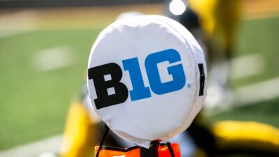 The logo of the Big Ten Conference is seen on a yard marker during Iowa Hawkeyes football Kids Day at Kinnick open practice