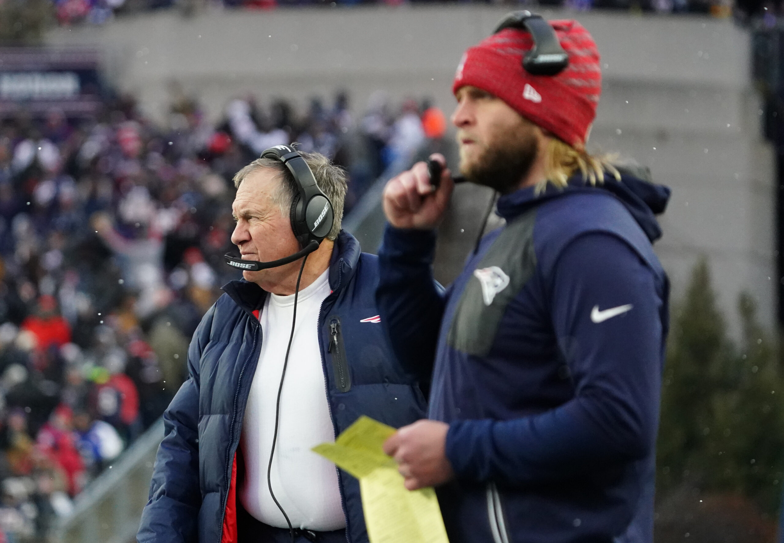 Nov 28, 2021; Foxborough, Massachusetts, USA; New England Patriots head coach Bill Belichick and outside linebackers coach Steve Belichick (foreground) on the sideline as they take on the Tennessee Titans in the second half at Gillette Stadium.