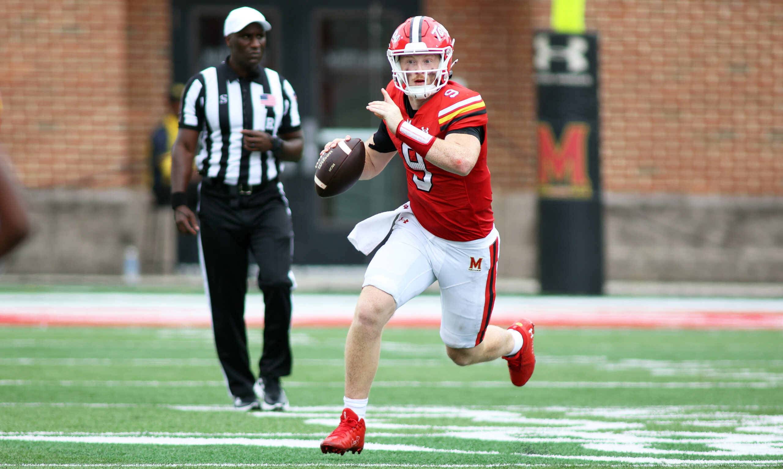 Aug 31, 2024; College Park, Maryland, USA; Maryland Terrapins quarterback Billy Edwards Jr. (9) signals to a receiver during the second quarter against the Connecticut Huskies at SECU Stadium.