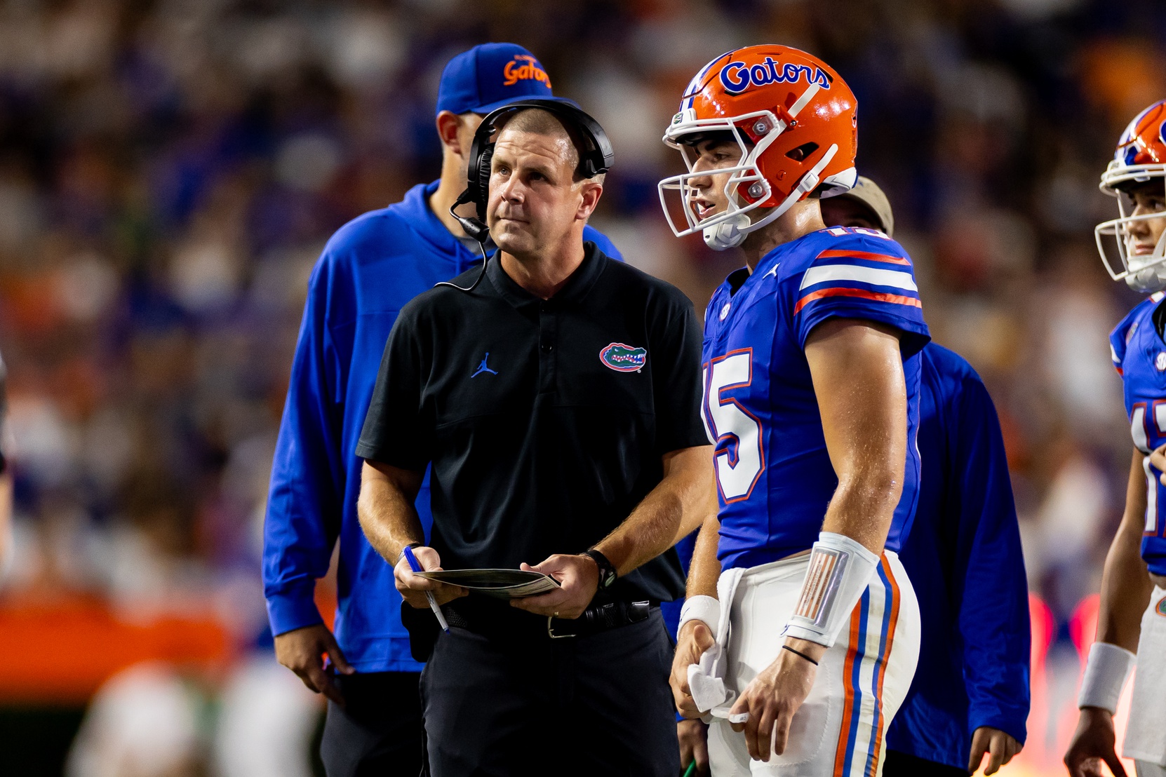 Sep 9, 2023; Gainesville, Florida, USA; Florida Gators head coach Billy Napier talks with Florida Gators quarterback Graham Mertz (15) during the first half against the McNeese State Cowboys at Ben Hill Griffin Stadium.