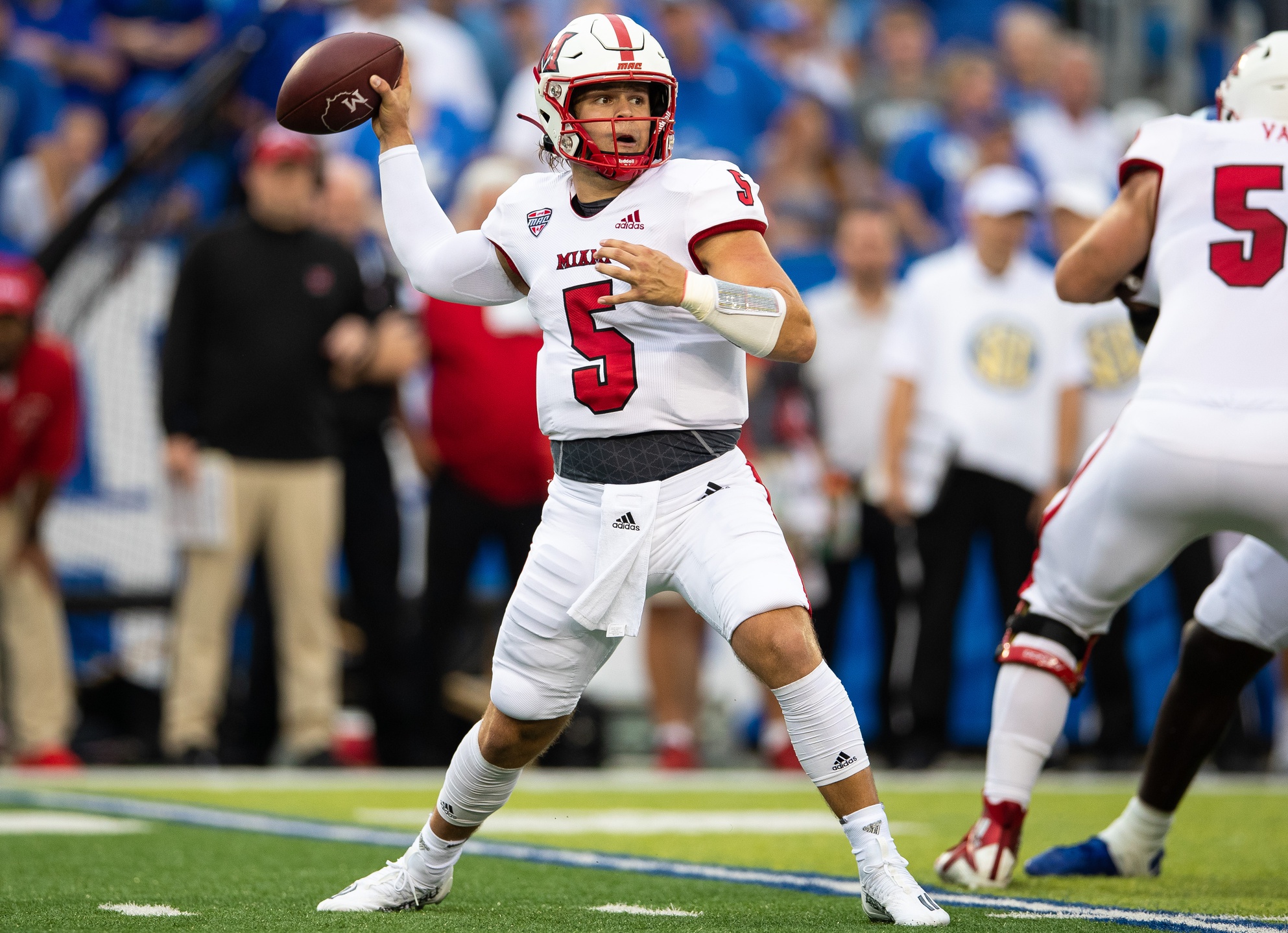 Sep 3, 2022; Lexington, Kentucky, USA; Miami (Oh) Redhawks quarterback Brett Gabbert (5) throws a pass during the first quarter against the Kentucky Wildcats at Kroger Field.