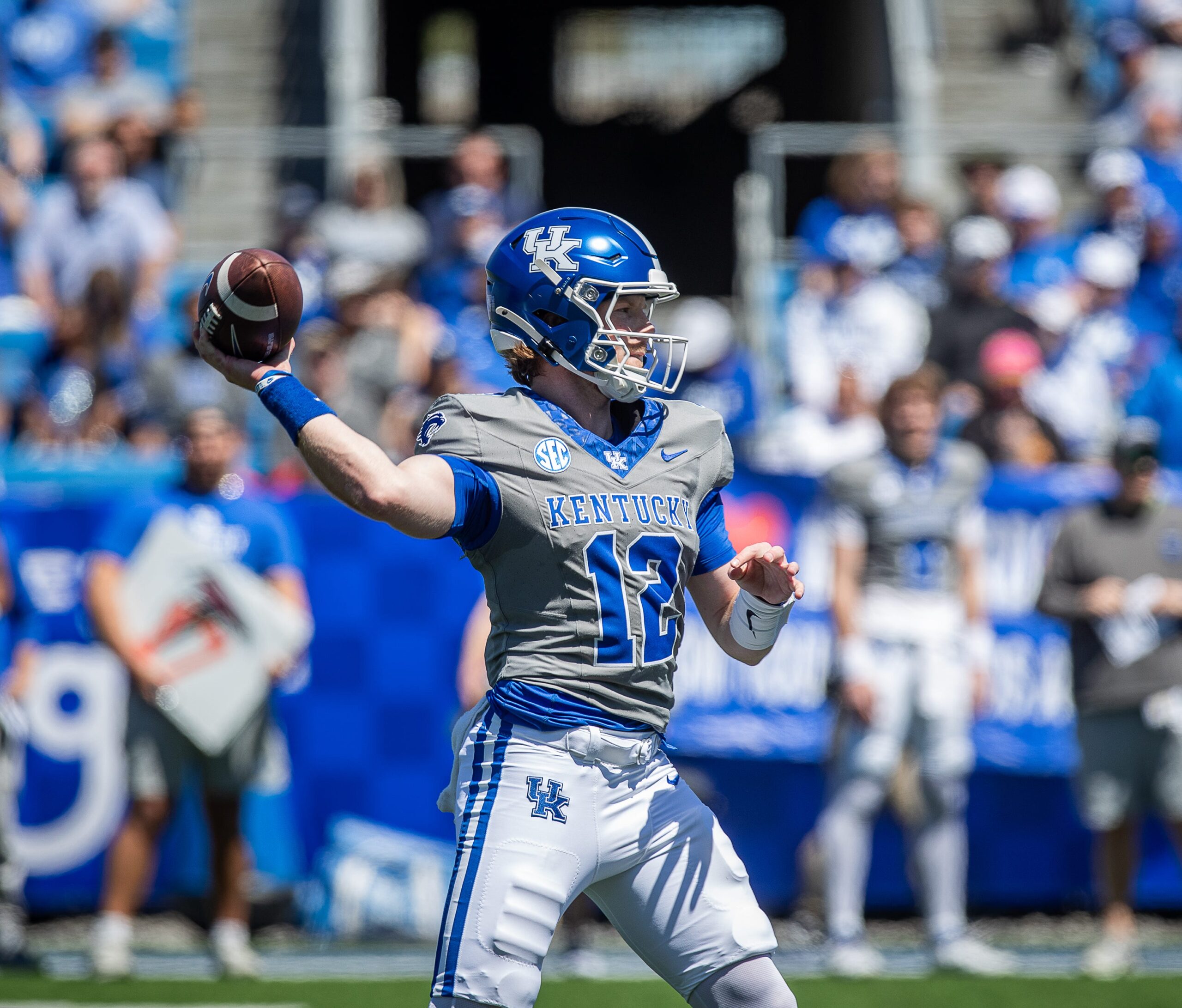 Kentucky quarterback Brock Vandagriff (12) dropped back for a pass during the Kentucky Wildcats' Blue White scrimmage at Kroger Field on Saturday afternoon in Lexington, Kentucky. April 13, 2024