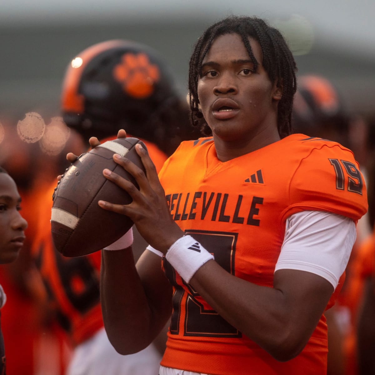 Belleville quarterback Bryce Underwood (19) runs the offense against Detroit Cass Tech during first-half action at Novi High School on Friday, Nov. 18, 2022.