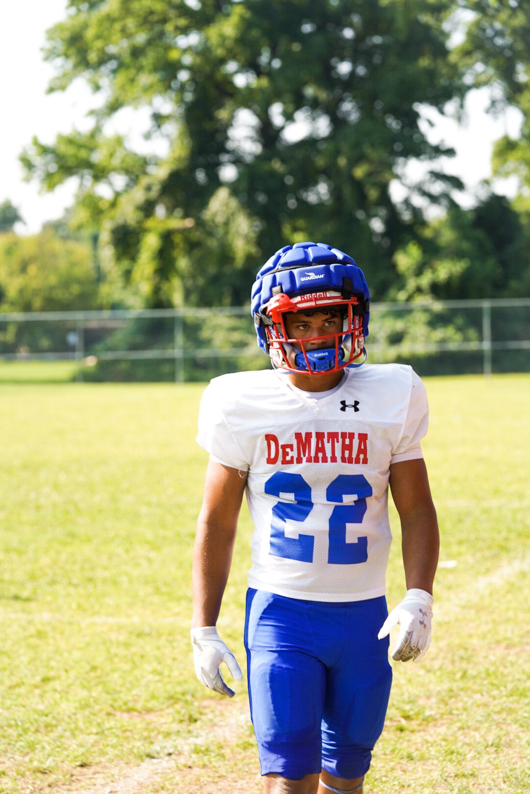 2025 3-star RB Bud Coombs from Hyattsville, Maryland (Dematha Catholic) standing on the practice field