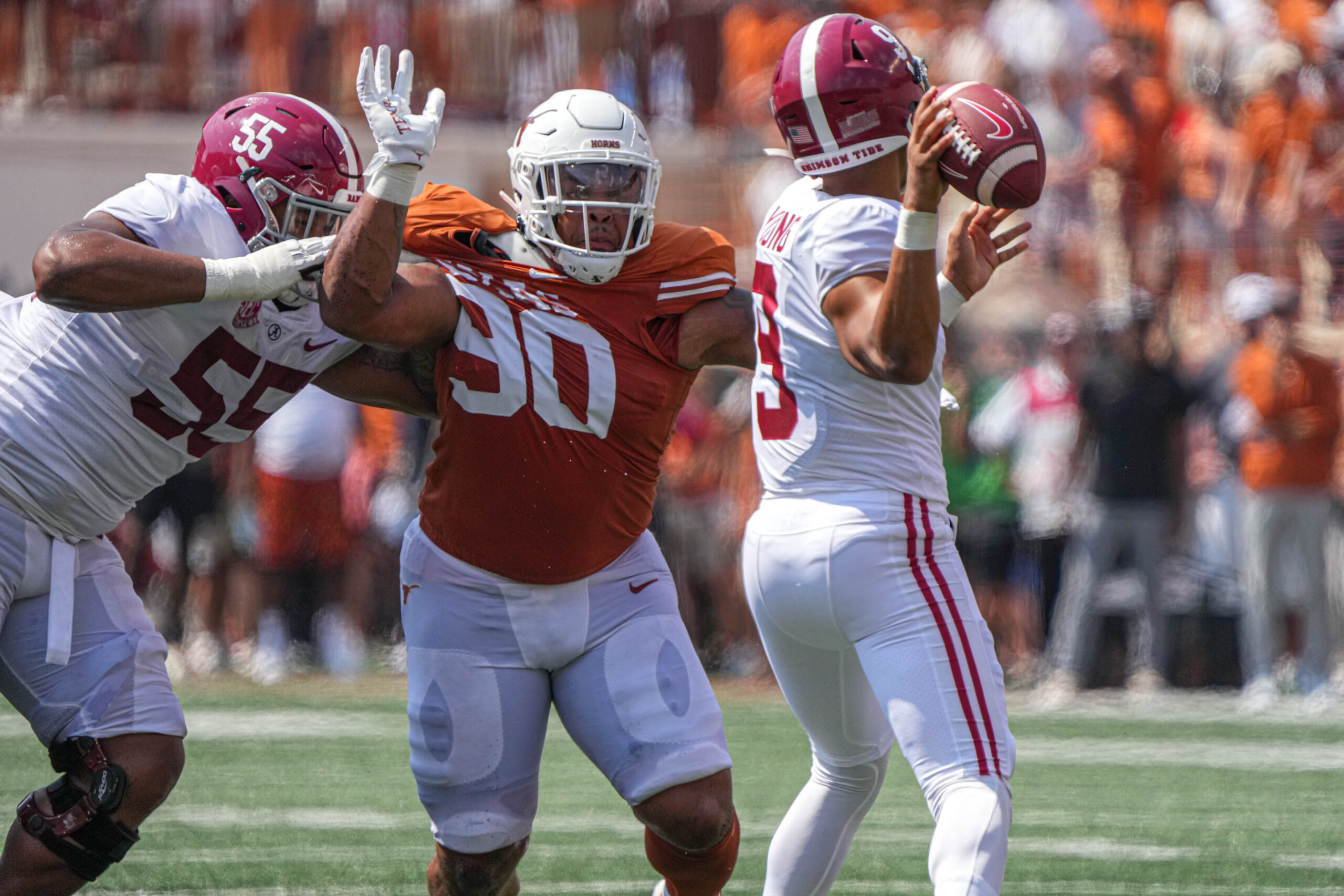 Sep 10, 2022; Austin, TX, USA; Texas defensive lineman Byron Murphy II (90) rushes Alabama quarterback Bryce Young (9) during the game at Royal Memorial Stadium on Sep. 10, 2022. Mandatory Credit: Aaron E. Martinez/Austin American-Statesman-USA TODAY NETWORK