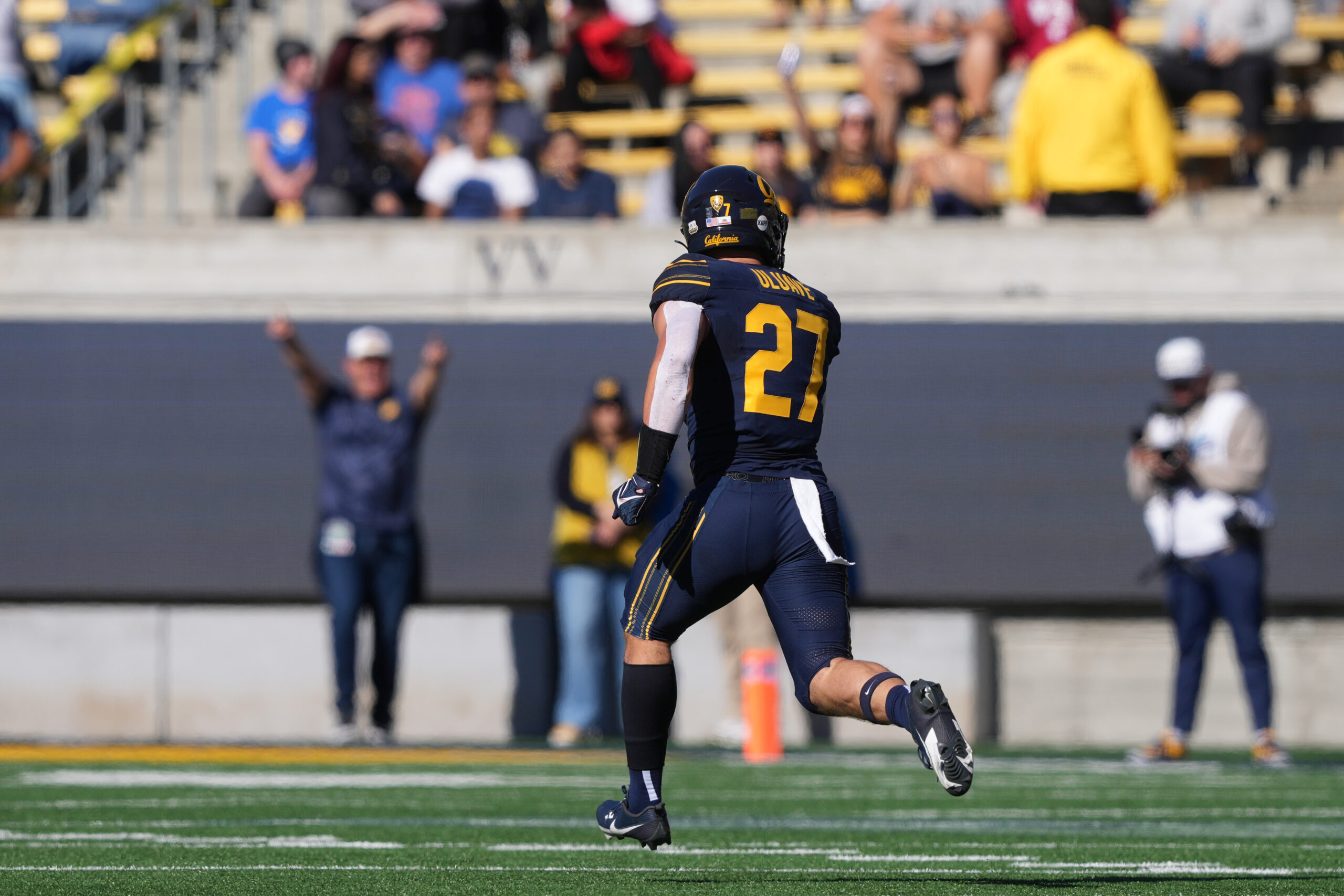 Nov 11, 2023; Berkeley, California, USA; California Golden Bears linebacker Cade Uluave (27) returns a fumble for a touchdown against the Washington State Cougars during the first quarter at California Memorial Stadium.