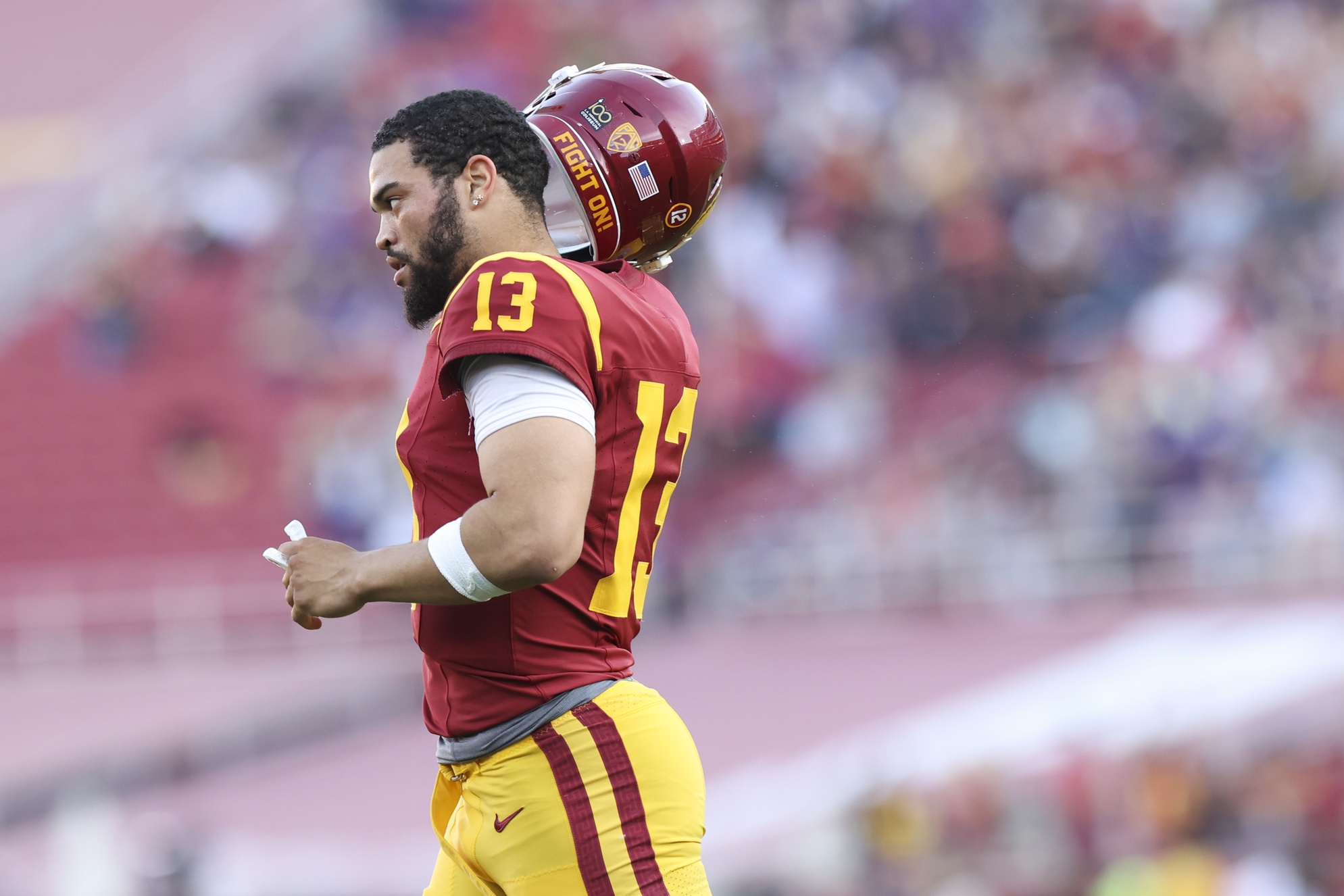Nov 4, 2023; Los Angeles, California, USA; USC Trojans quarterback Caleb Williams (13) runs towards the bench after a touchdown is scored during the first quarter against the Washington Huskies at United Airlines Field at Los Angeles Memorial Coliseum.