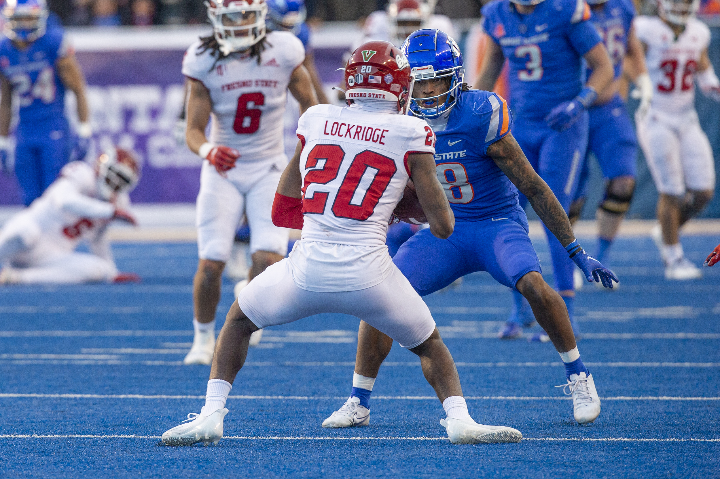 Dec 3, 2m Lockridge (20) picks off a pass intended for Boise State Bronco022; Boise, Idaho, USA; Fresno State Bulldogs defensive back Cas wide receiver Billy Bowens (18) during the second half of the Mountain West Championship game at Albertsons Stadium. Fresno State defeats Boise State 28-16.