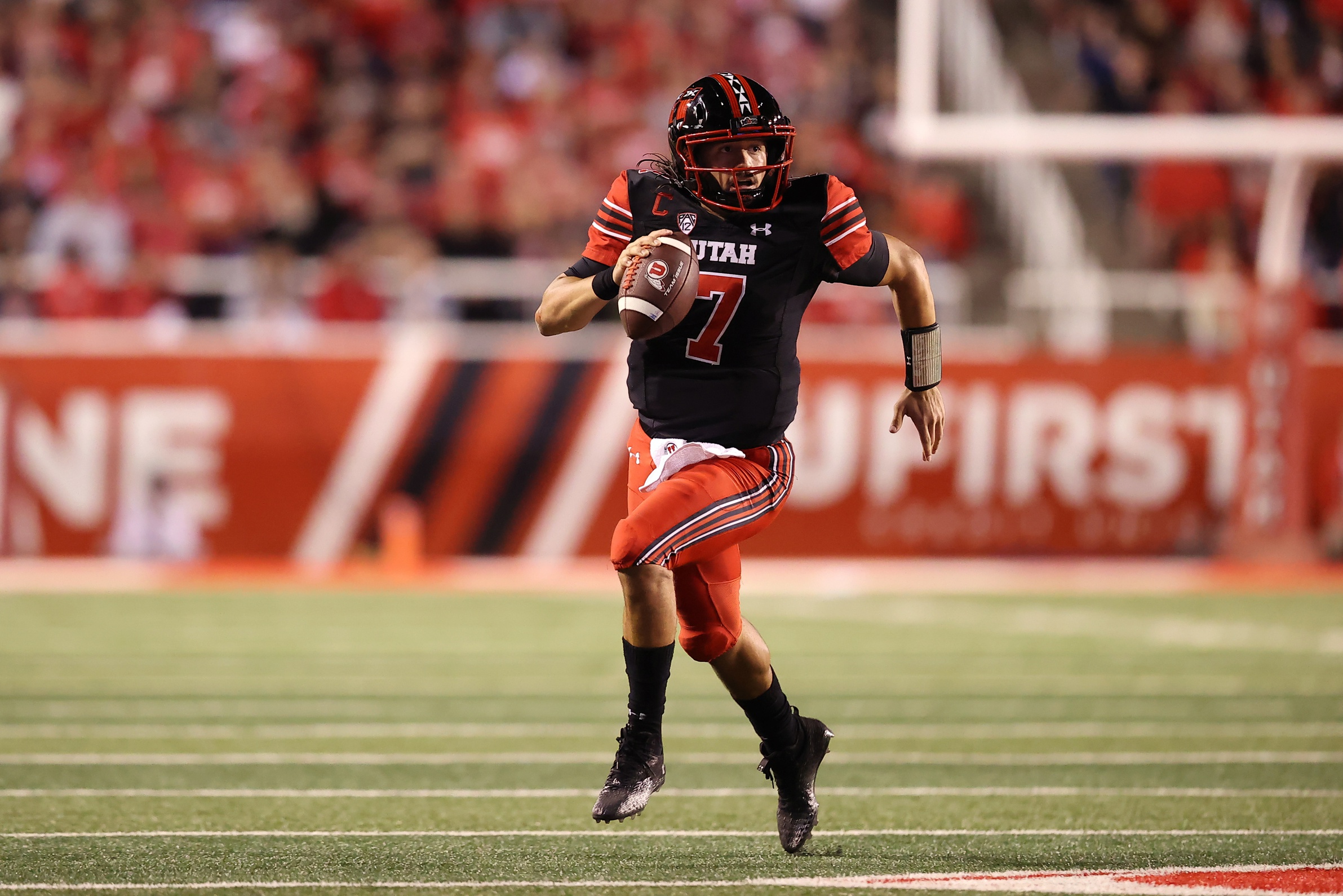 Sep 17, 2022; Salt Lake City, Utah, USA; Utah Utes quarterback Cameron Rising (7) runs the ball against the San Diego State Aztecs in the second quarter at Rice-Eccles Stadium.