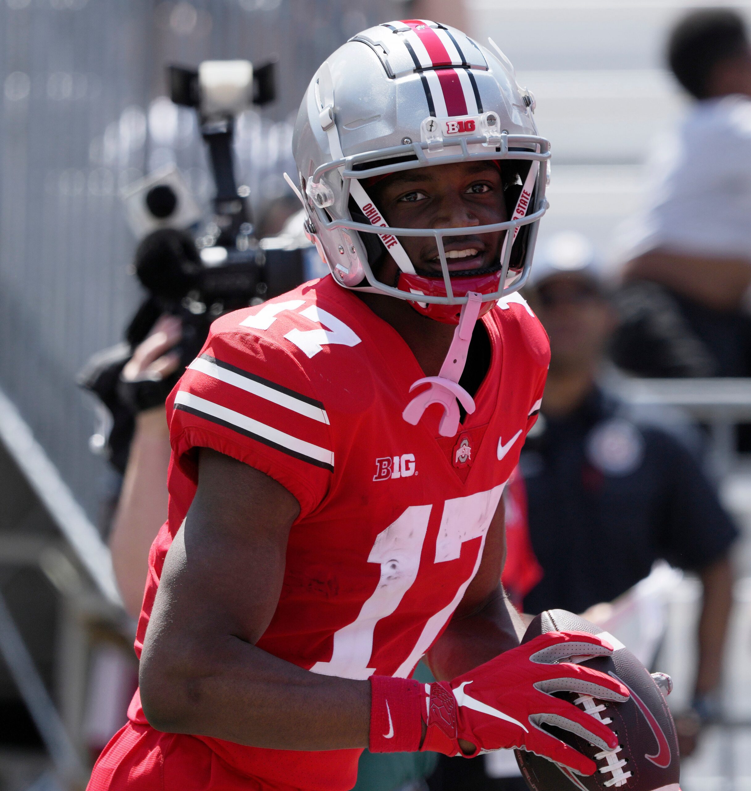 April 15, 2023; Columbus, Ohio, USA; Wide receiver Carnell Tate (17) scores a touchdown during the fourth quarter of the Ohio State spring football game Saturday at Ohio Stadium.