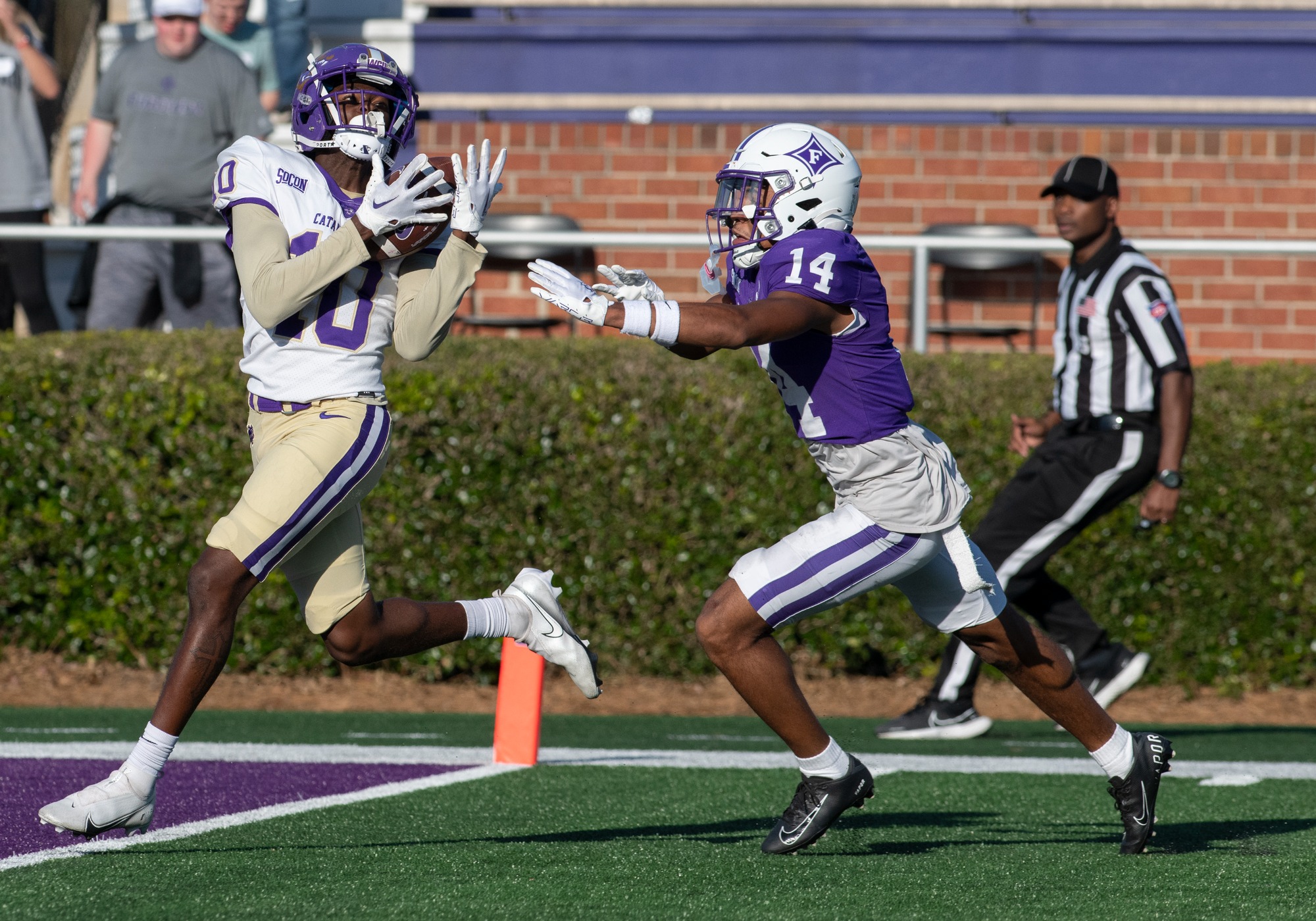 Western Carolina wide receiver Censere Lee catches a touchdown pass against Furman.