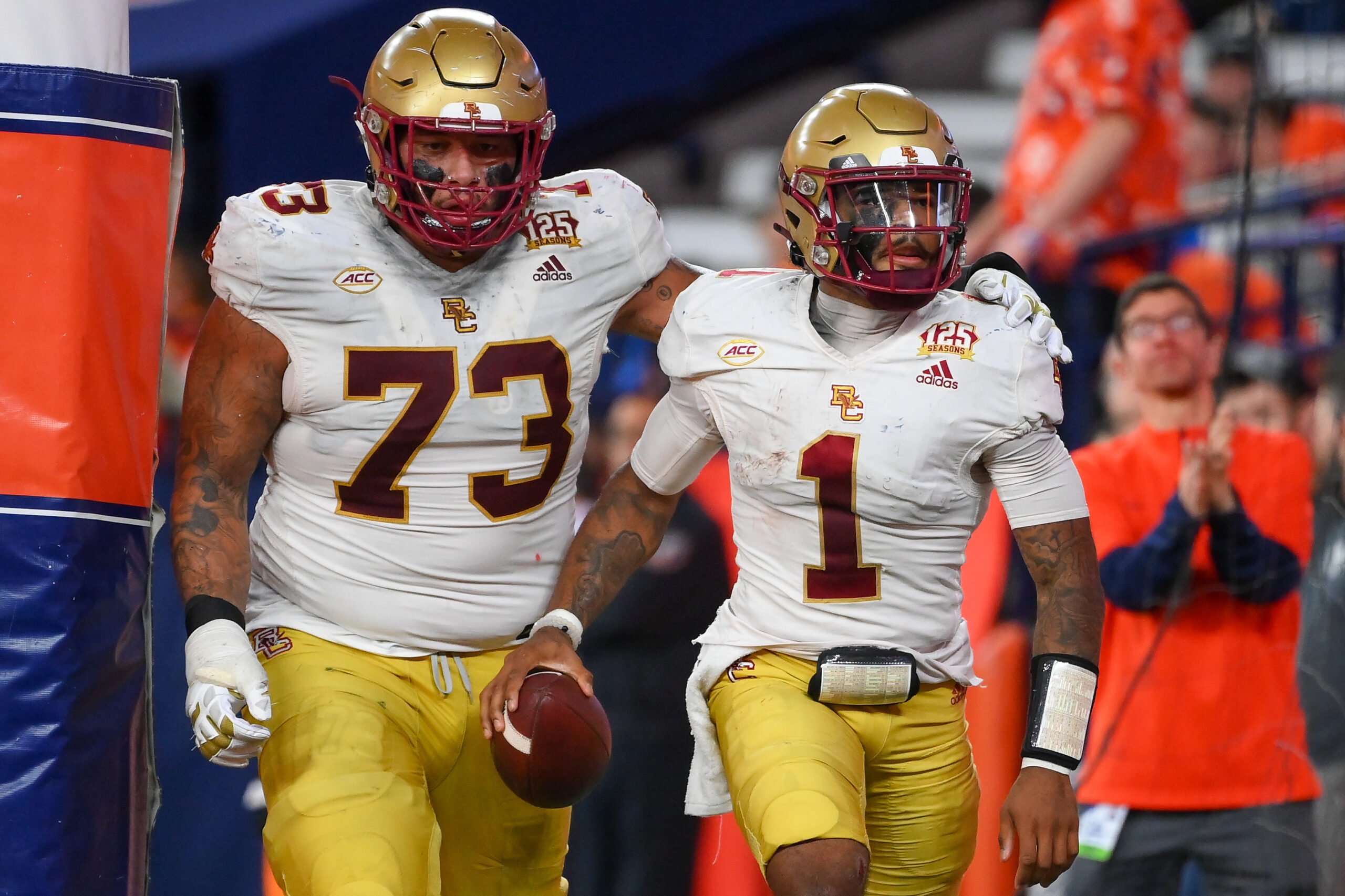 Nov 3, 2023; Syracuse, New York, USA; Boston College Eagles quarterback Thomas Castellanos (1) celebrates his touchdown run with teammate offensive lineman Christian Mahogany (73) against the Syracuse Orange during the second half at the JMA Wireless Dome. 