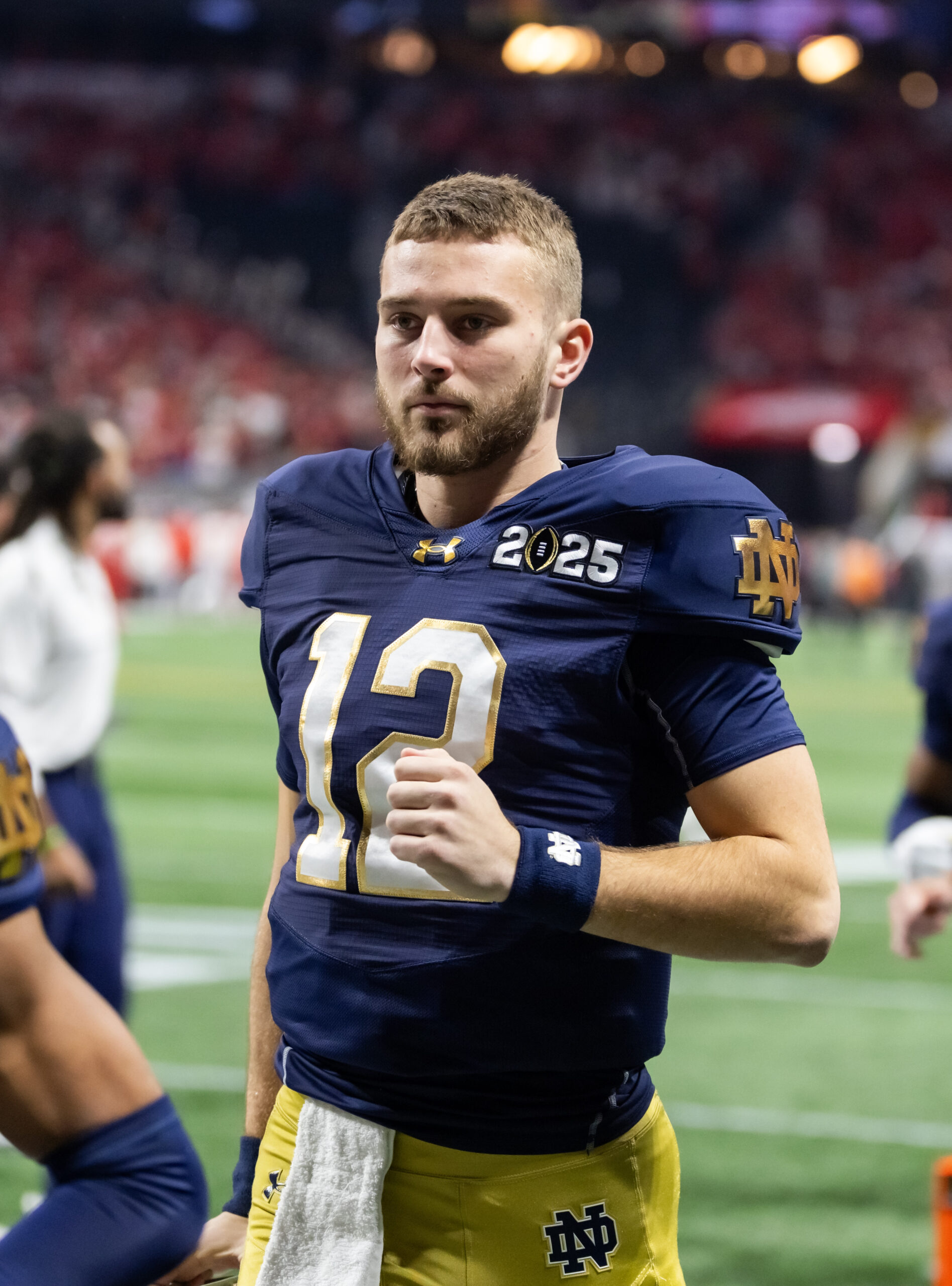 Jan 20, 2025; Atlanta, GA, USA; Notre Dame Fighting Irish quarterback CJ Carr (12) against the Ohio State Buckeyes during the CFP National Championship college football game at Mercedes-Benz Stadium.