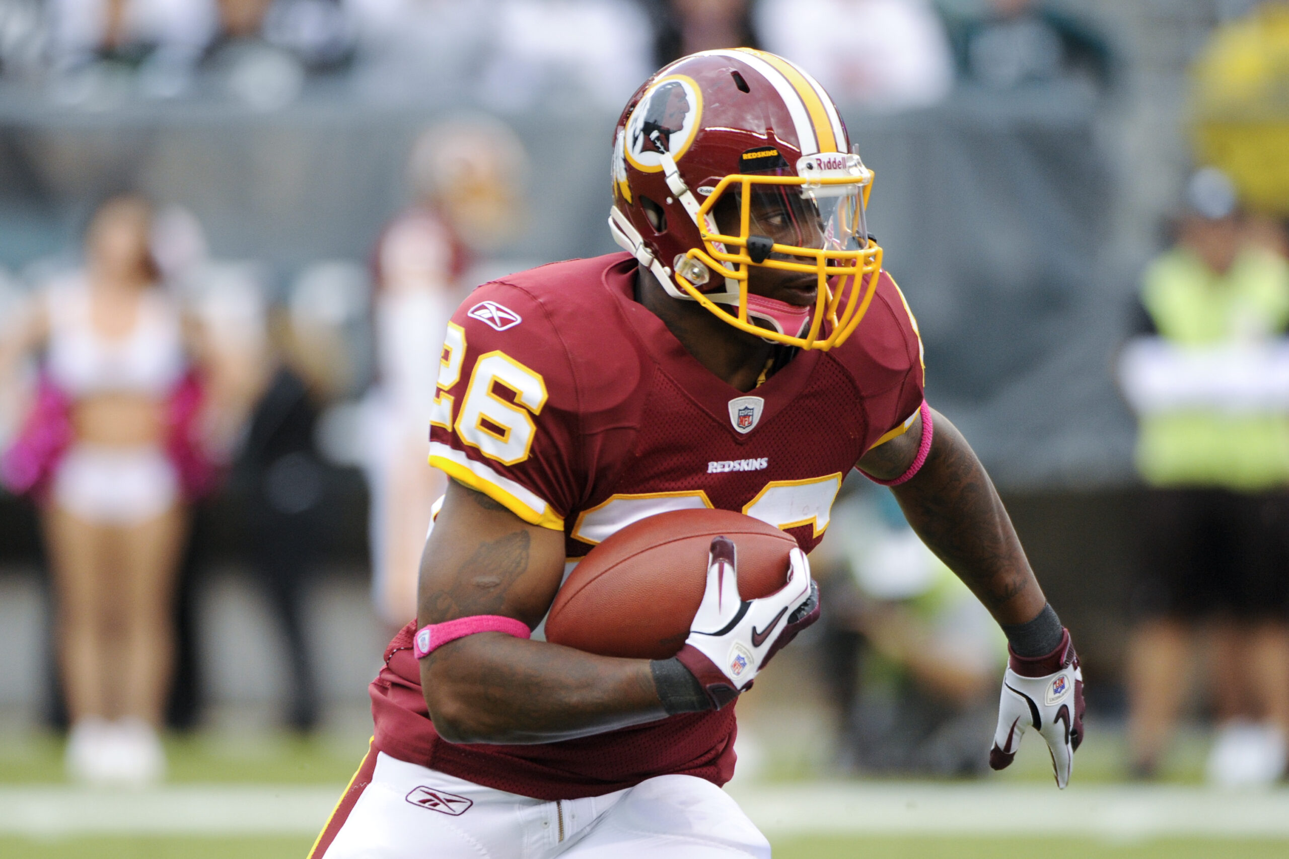 Oct 03, 2010; Philadelphia, PA, USA; Washington Redskins running back Clinton Portis (26) carries the ball during the first quarter against the Philadelphia Eagles at Lincoln Financial Field. The Redskins defeated the Eagles 17-12.