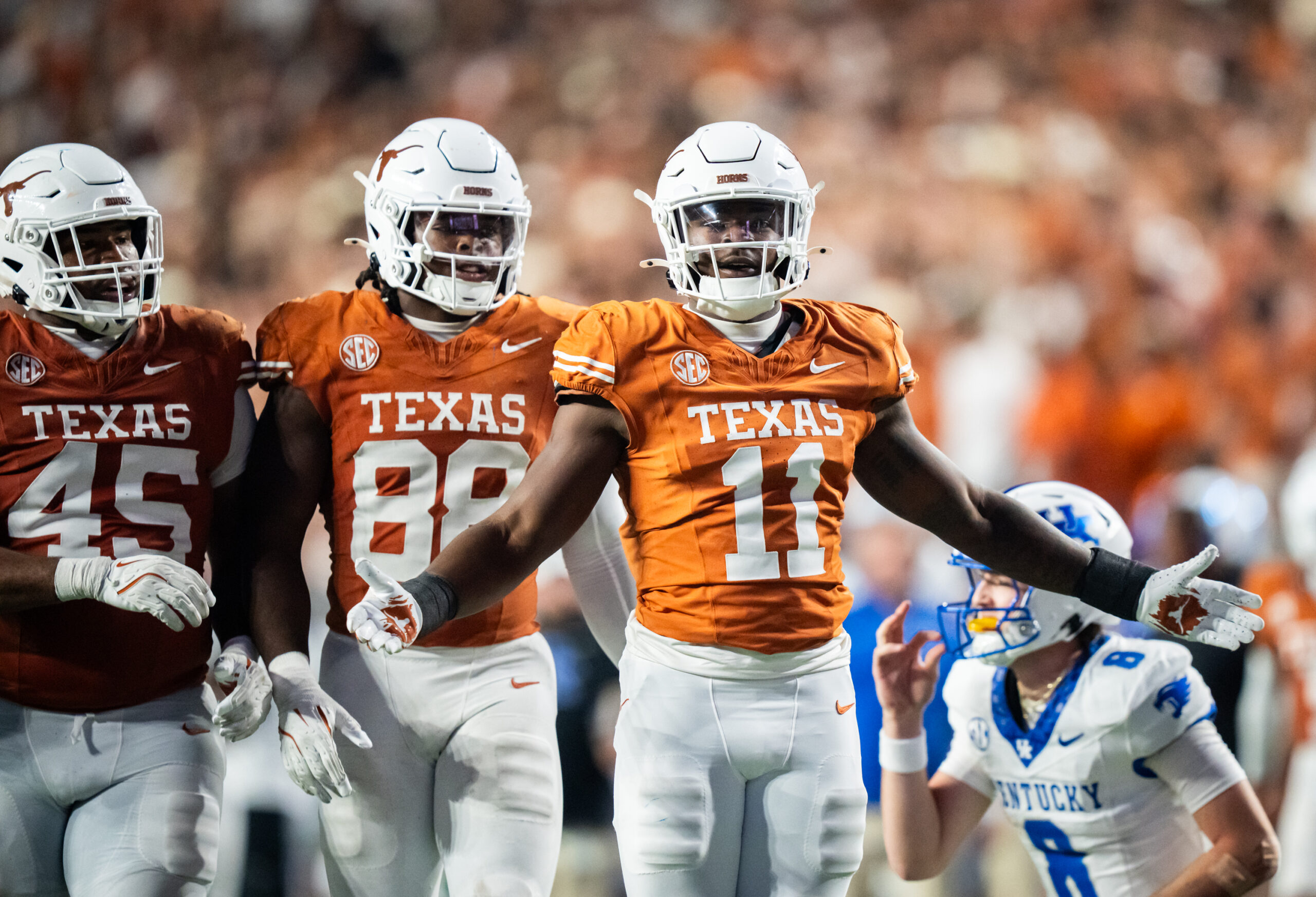Nov 23, 2024; Austin, Texas, USA; Texas Longhorns linebacker Colin Simmons (11) celebrates after a quarterback sack against the Kentucky Wildcats in the fourth quarter at Darrell K Royal Texas Memorial Stadium.