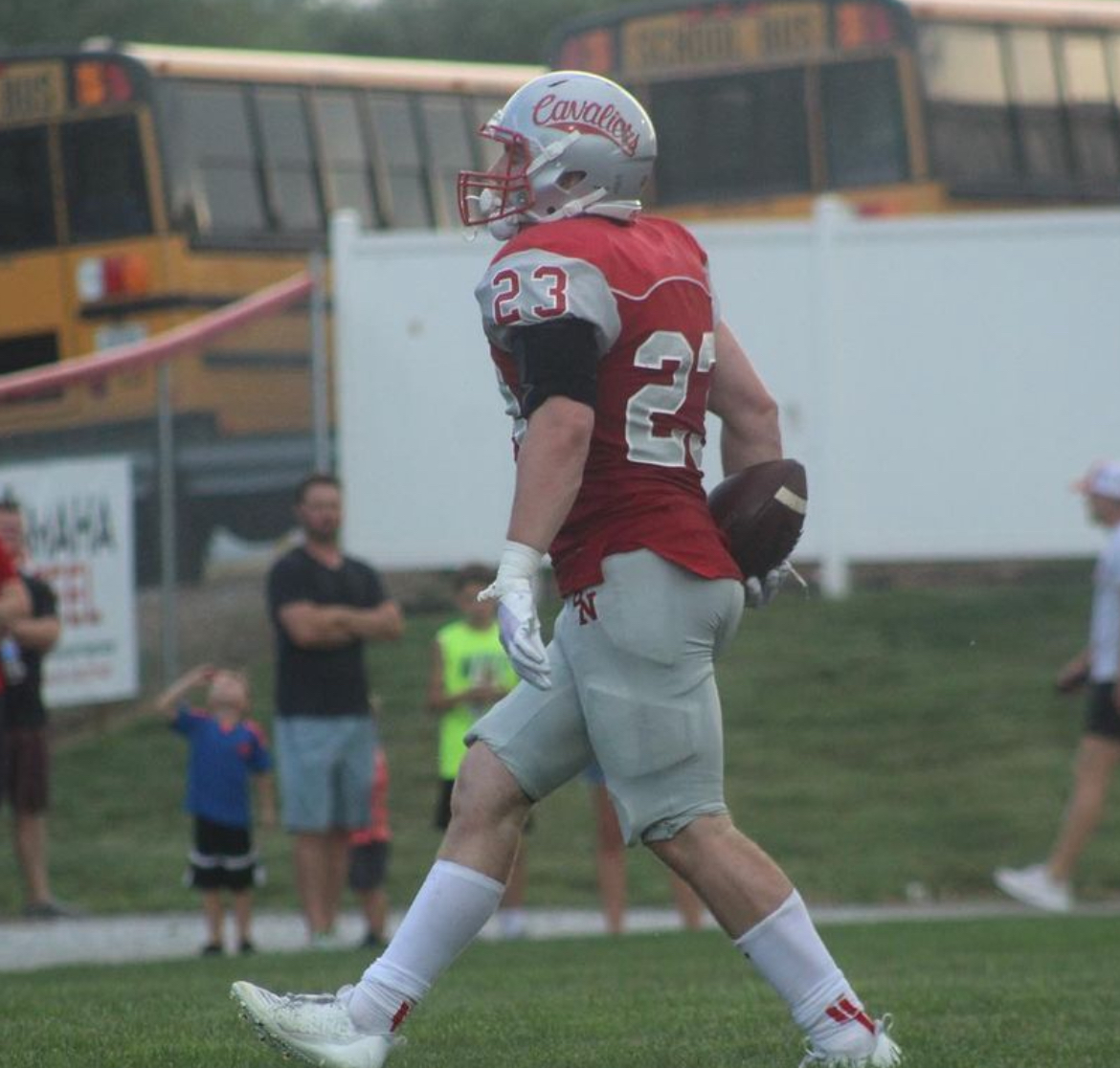 2025 3-star RB Conor Booth from Wahoo, Nebraska (Bishop Neumann) holding the ball after getting in the end zone