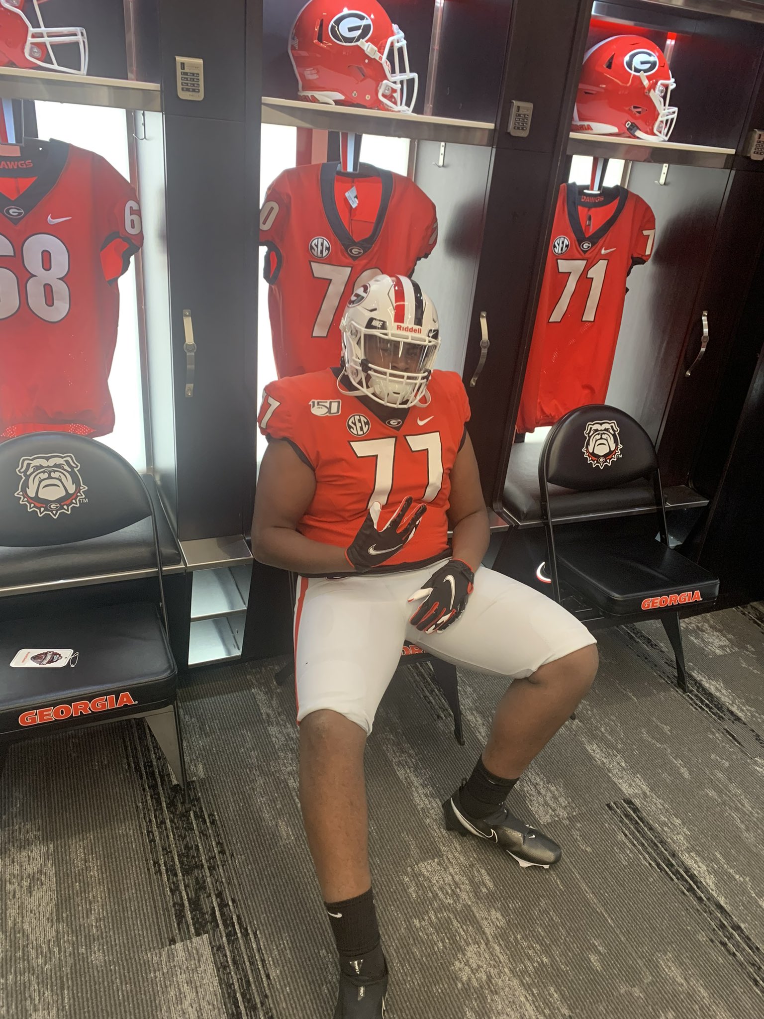 Four-star 2025 Offensive Tackle Cortez Smith from Linburn, GA (Parkview) takes a picture on a visit to Georgia