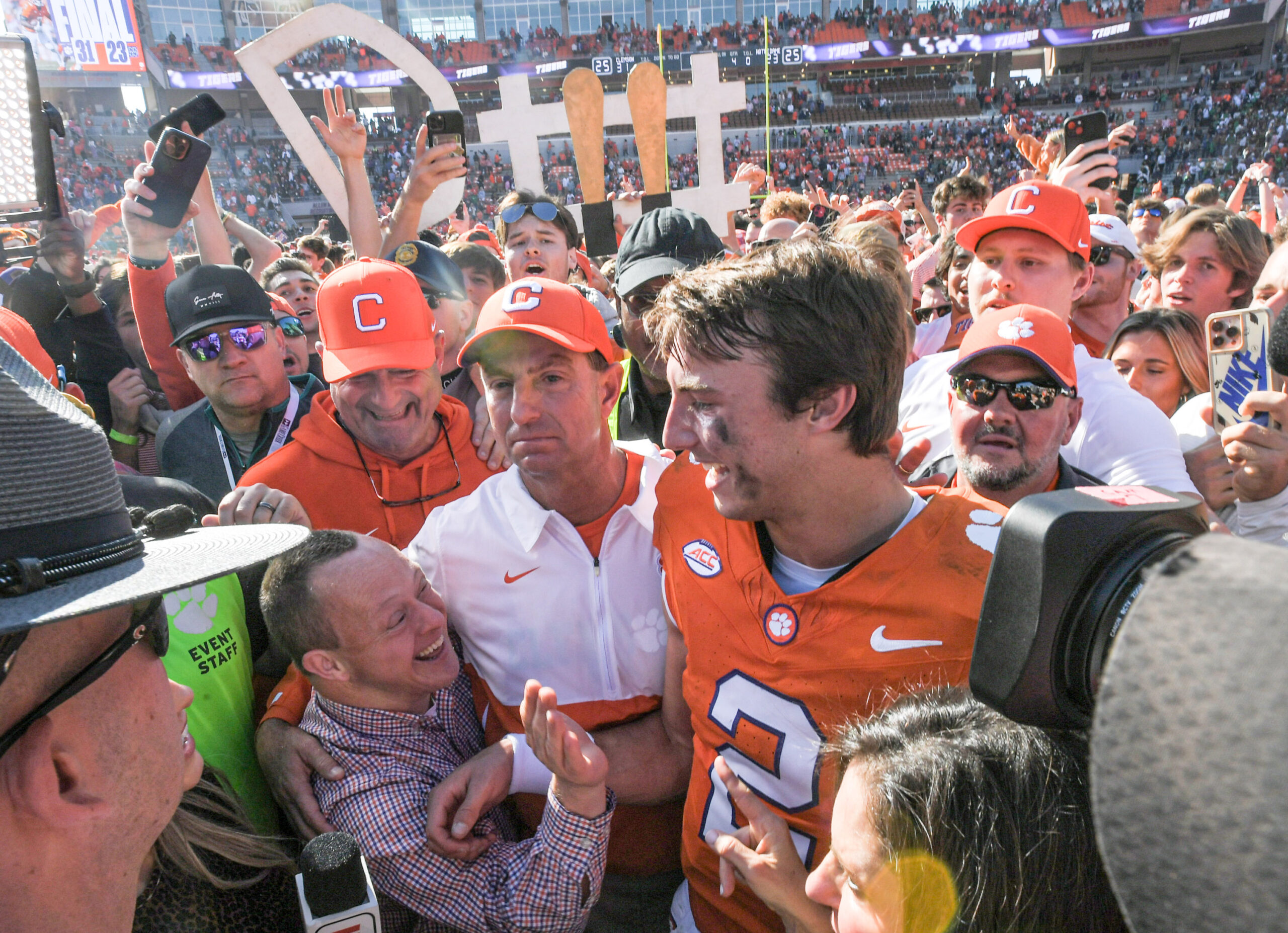 Nov 4, 2023; Clemson, South Carolina, USA; Clemson Tigers head coach Dabo Swinney celebrates with quarterback Cade Klubnik (2) after defeating the Notre Dame Fighting Irish at Memorial Stadium.