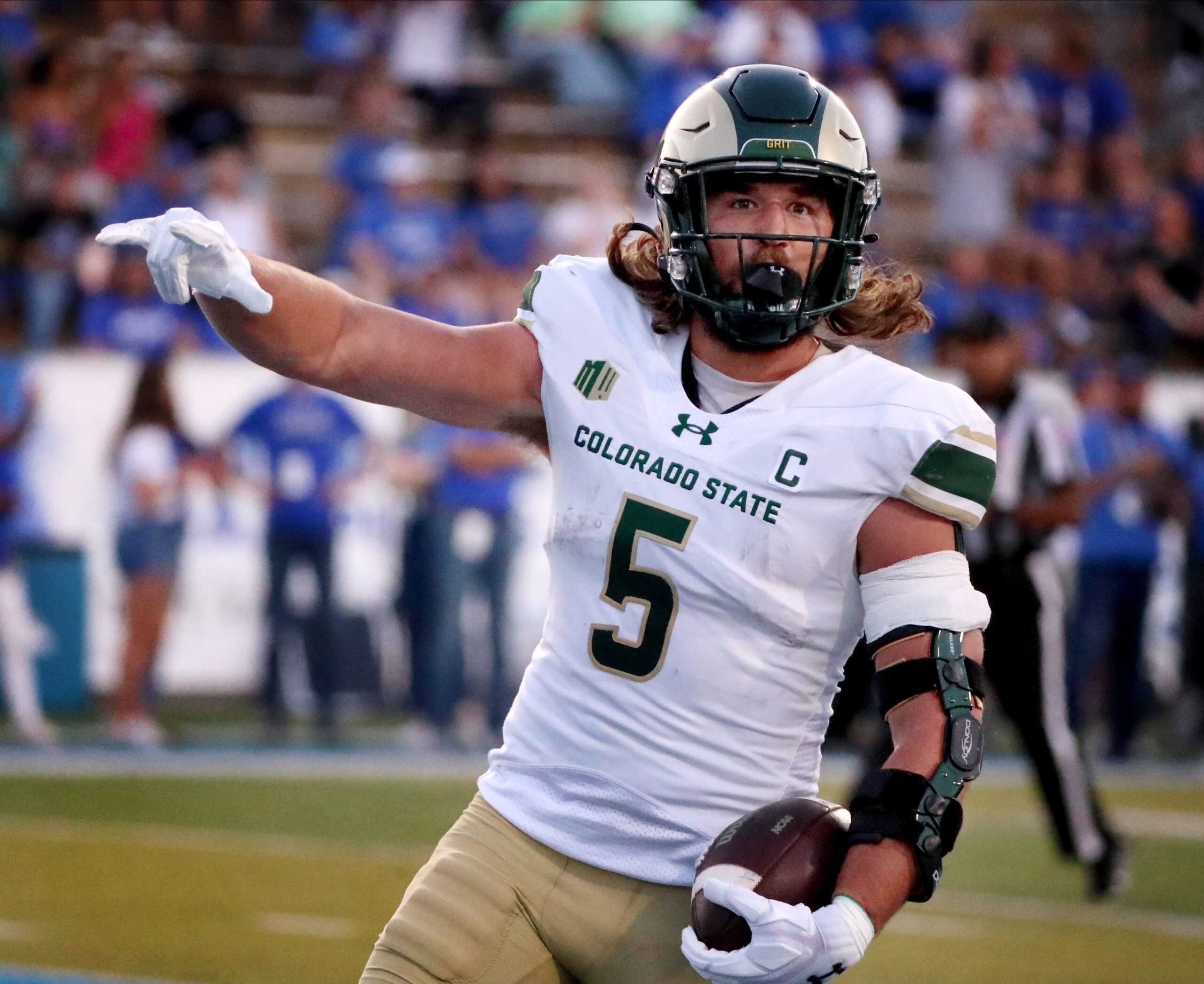 Oct 21, 2023; Paradise, Nevada, USA; Colorado State Rams tight end Dallin Holker (5) makes a catch behind UNLV Rebels defensive back Cameren Jenkins (13) during the fourth quarter at Allegiant Stadium.