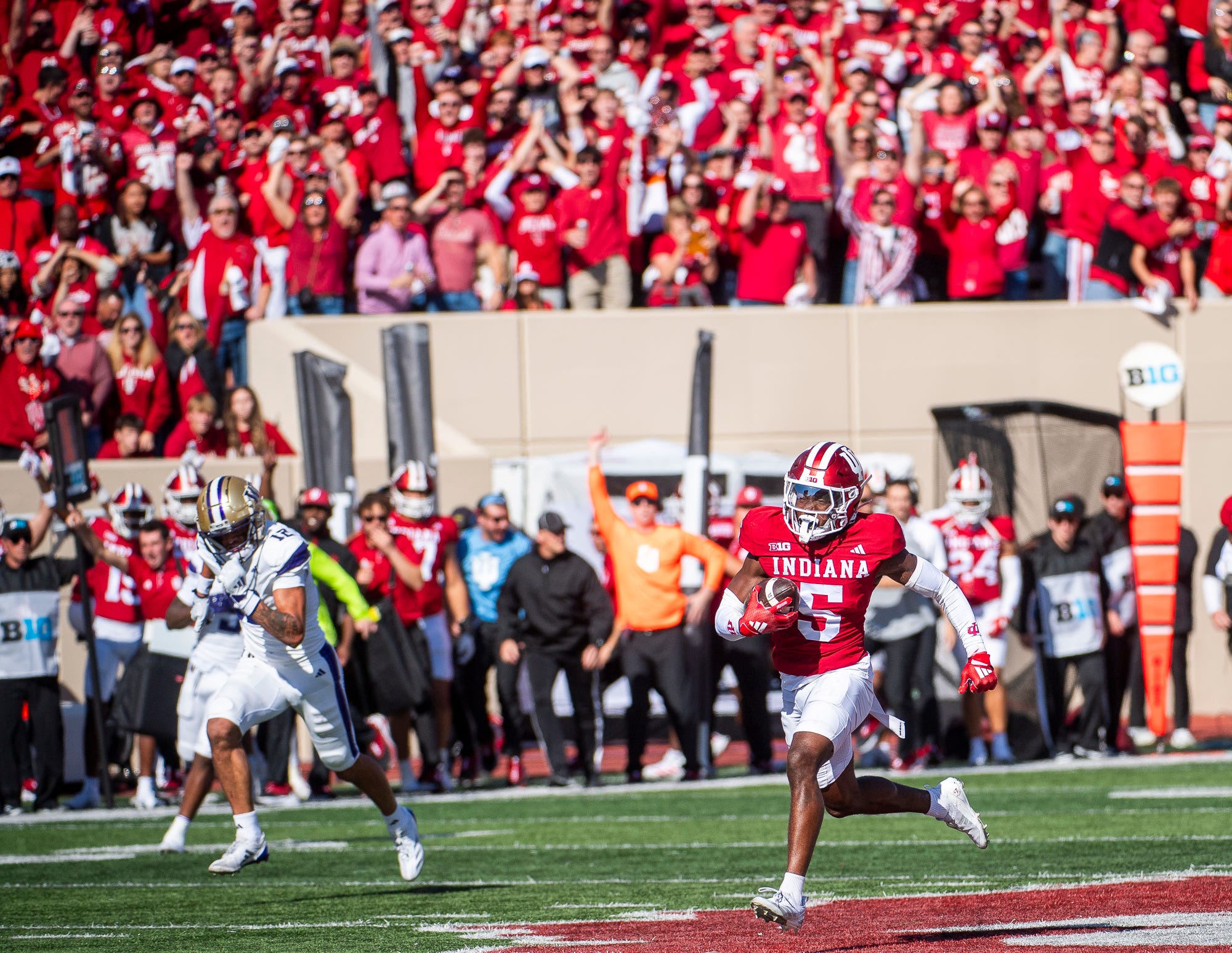 Indiana's D'Angelo Ponds (5) makes an interception and returns it for a touchdown during the Indiana versus Washington football game at Memorial Stadium on Oct. 26, 2024.