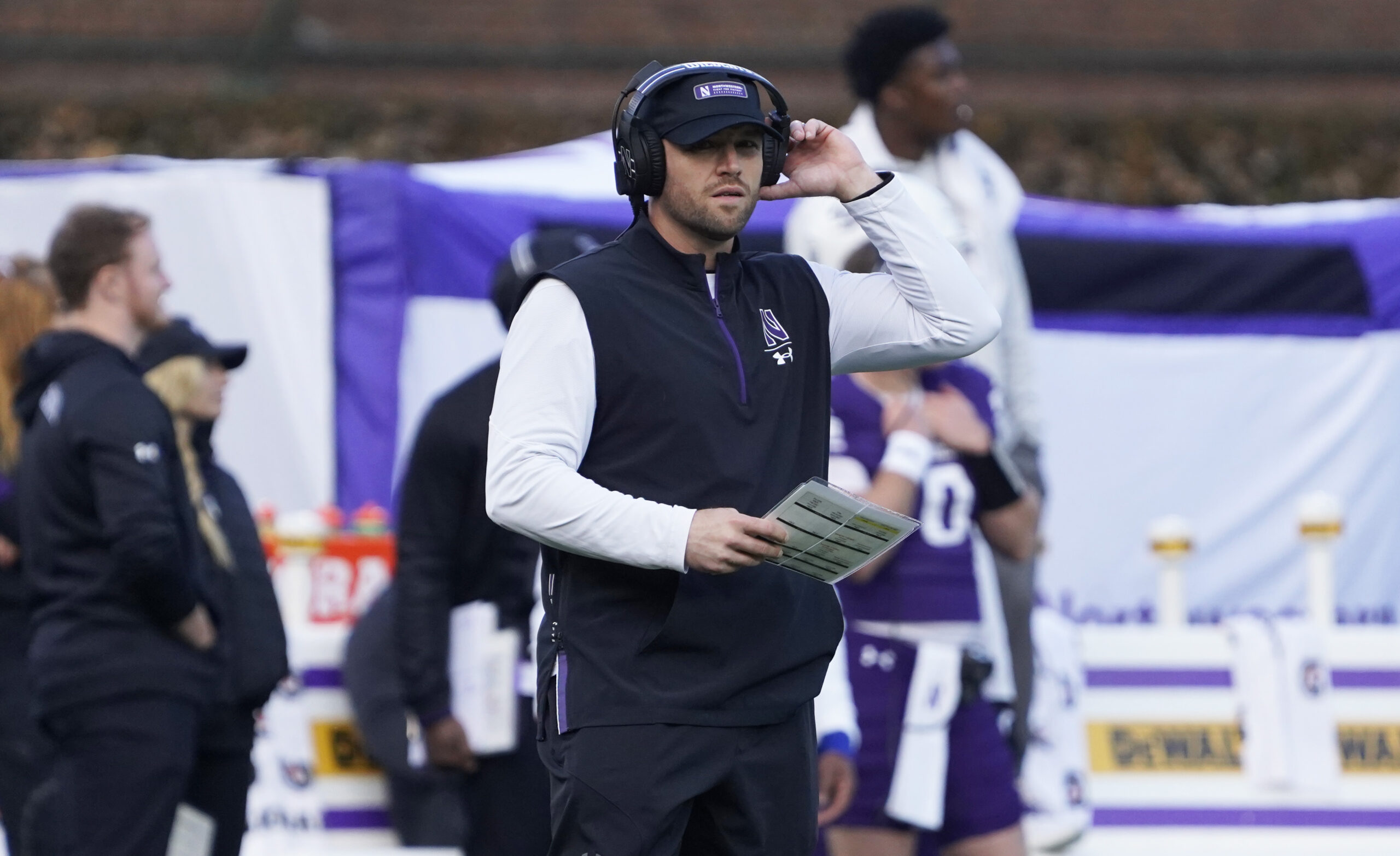 Nov 4, 2023; Chicago, Illinois, USA; Northwestern Wildcats head coach David Braun looks on during the first half against the Iowa Hawkeyes at Wrigley Field.