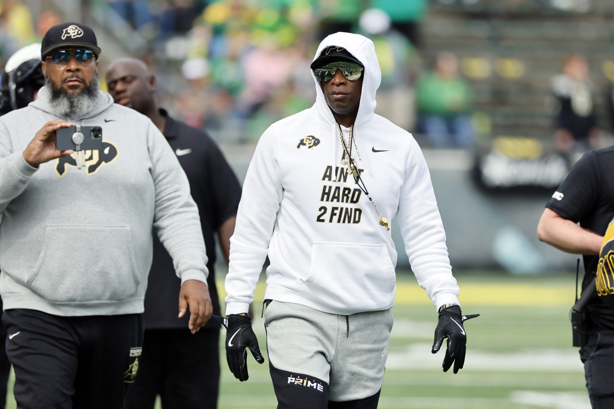 Sep 23, 2023; Eugene, Oregon, USA; Colorado Buffaloes head coach Deion Sanders walks on the field before the game against the Oregon Ducks at Autzen Stadium.