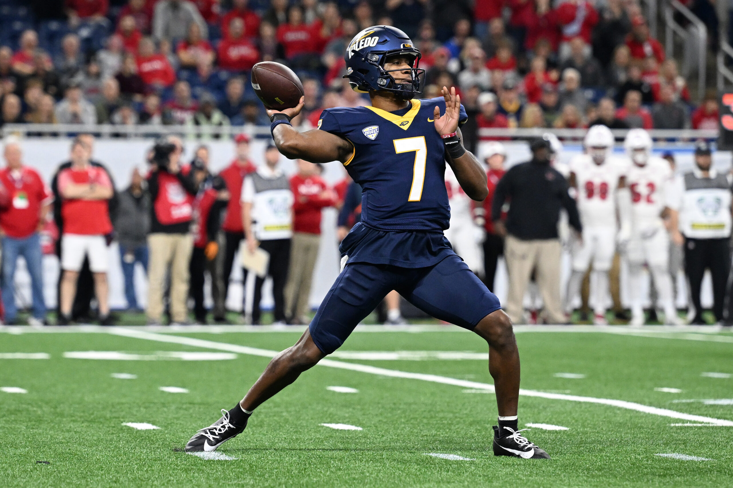 Dec 2, 2023; Detroit, MI, USA; Toledo Rockets quarterback Dequan Finn (7) throws a pass against the Miami (OH) Redhawks in the first quarter at Ford Field.