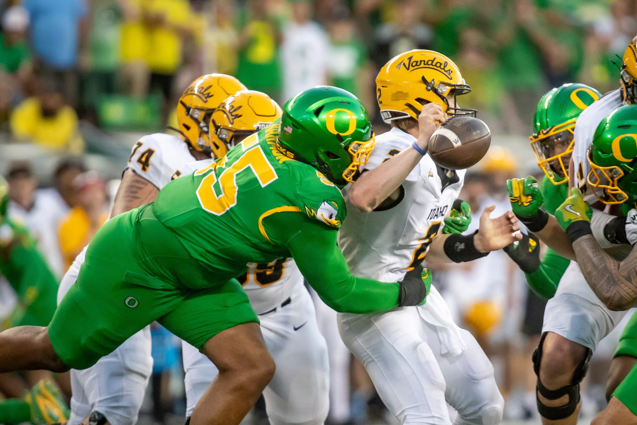 Oregon Ducks defensive lineman Derrick Harmon forces a fumble from Idaho Vandals quarterback Jack Layne as the Oregon Ducks host the Idaho Vandals Saturday, Aug. 31, 2024 at Autzen Stadium in Eugene, Ore.