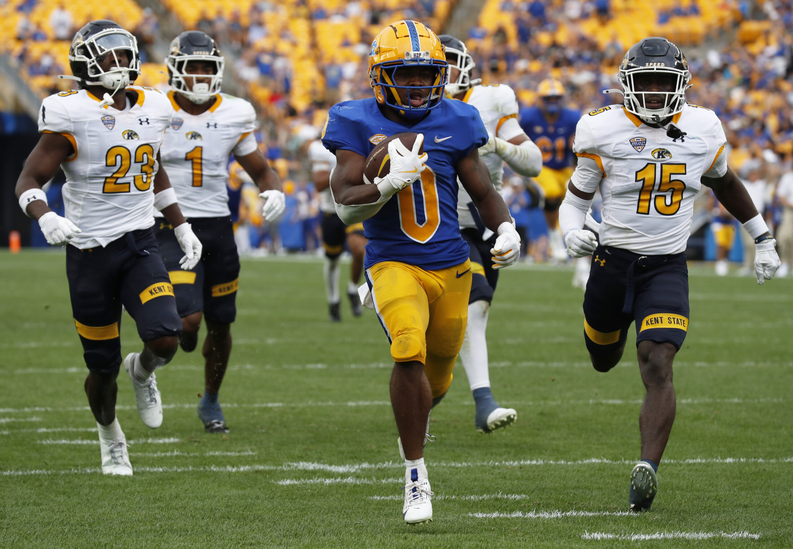 Aug 31, 2024; Pittsburgh, Pennsylvania, USA; Pittsburgh Panthers running back Desmond Reid (0) runs on his way to scoring a touchdown against the Kent State Golden Flashes during the third quarter at Acrisure Stadium. Pittsburgh won 55-24. 