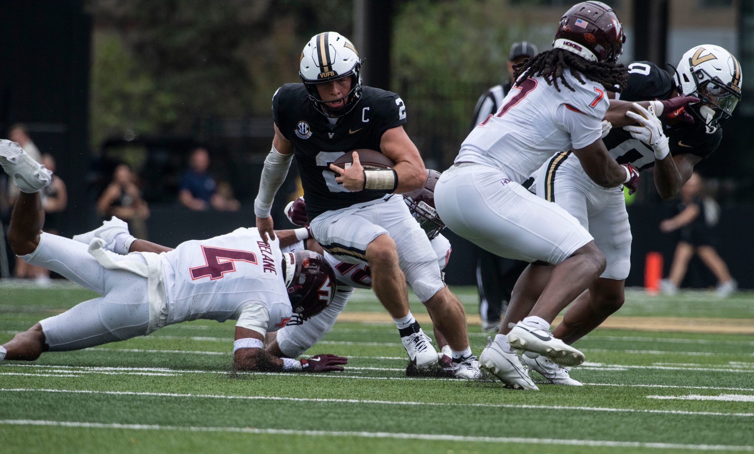 Vanderbilt ’s Diego Pavia runs the ball during Saturday’s game between Vanderbilt and Virginia Tech at FirstBank Stadium in Nashville , Tenn., Saturday, Aug. 31, 2024.