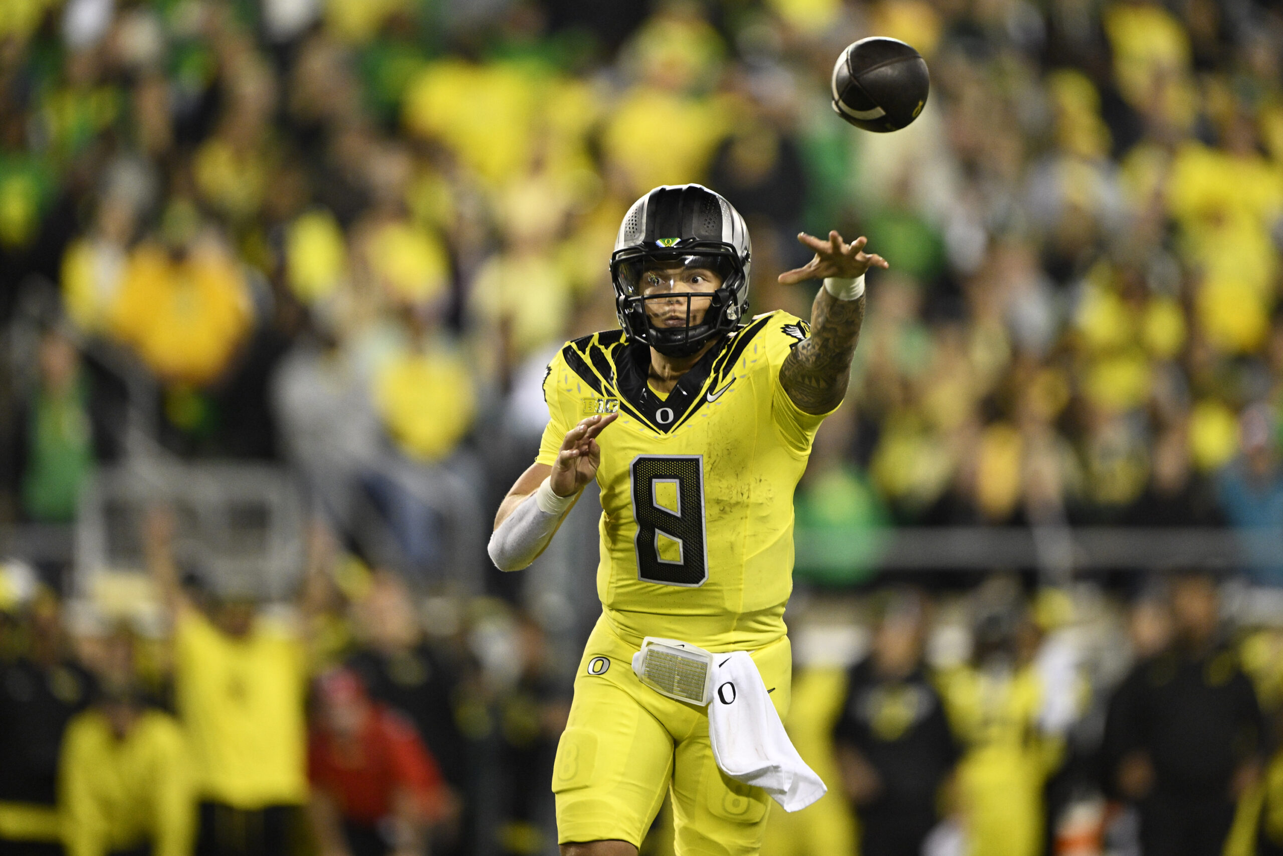 Oct 4, 2024; Eugene, Oregon, USA; Oregon Ducks quarterback Dillon Gabriel (8) throws a touchdown pass during the second half against the Michigan State Spartans at Autzen Stadium.
