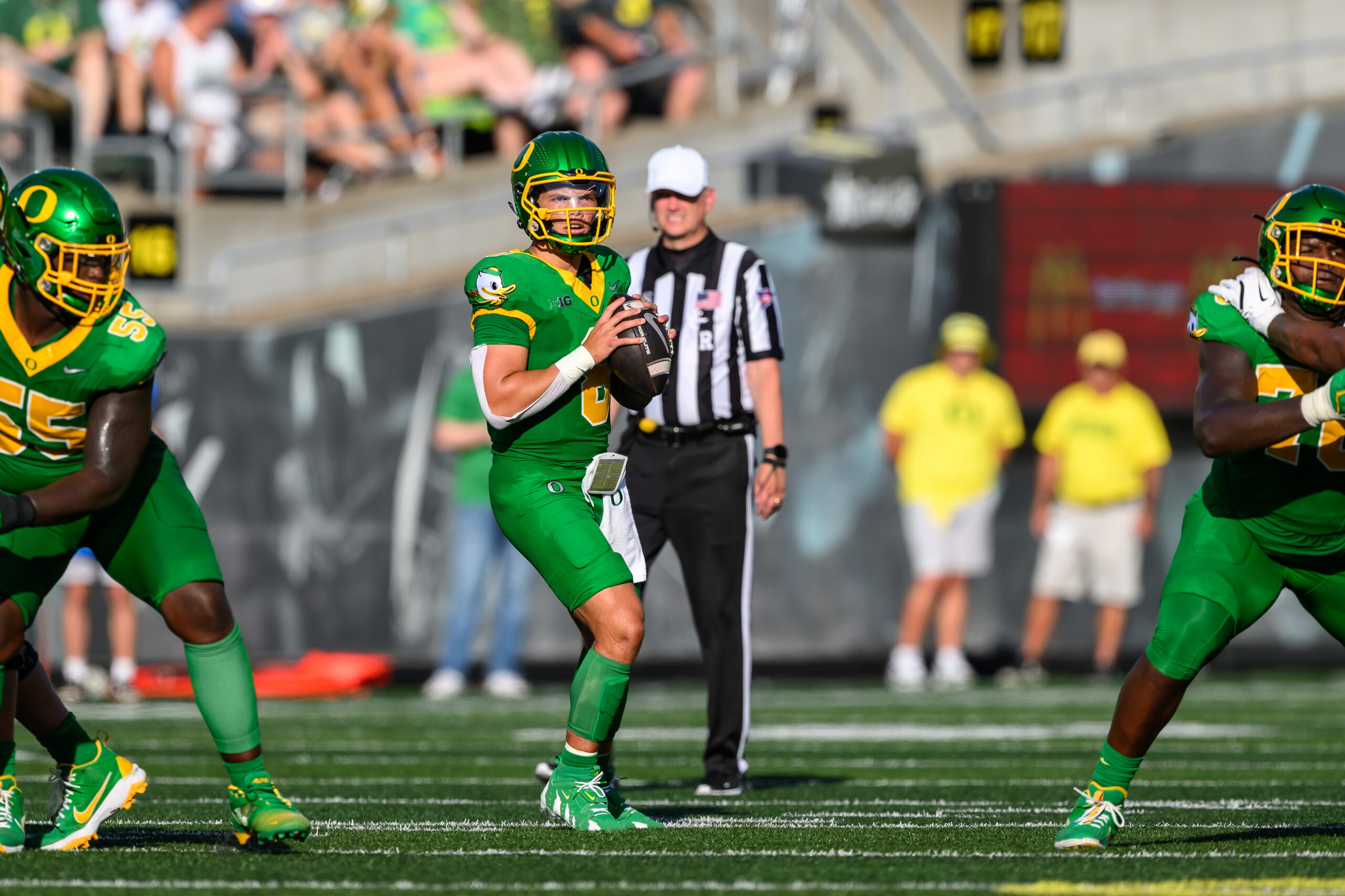 Aug 31, 2024; Eugene, Oregon, USA; Oregon Ducks quarterback Dillon Gabriel (8) sets up to pass during the first half against the Idaho Vandals at Autzen Stadium.