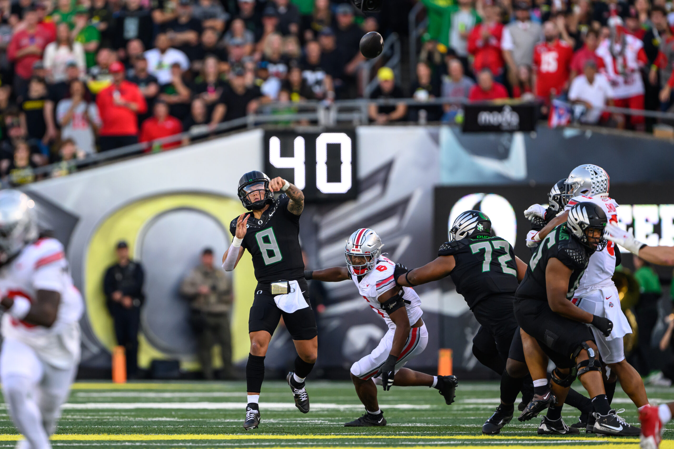 Oregon quarterback Dillon Gabriel throws during practice with the Oregon Ducks Tuesday, April 2, 2024 in Eugene, Ore.