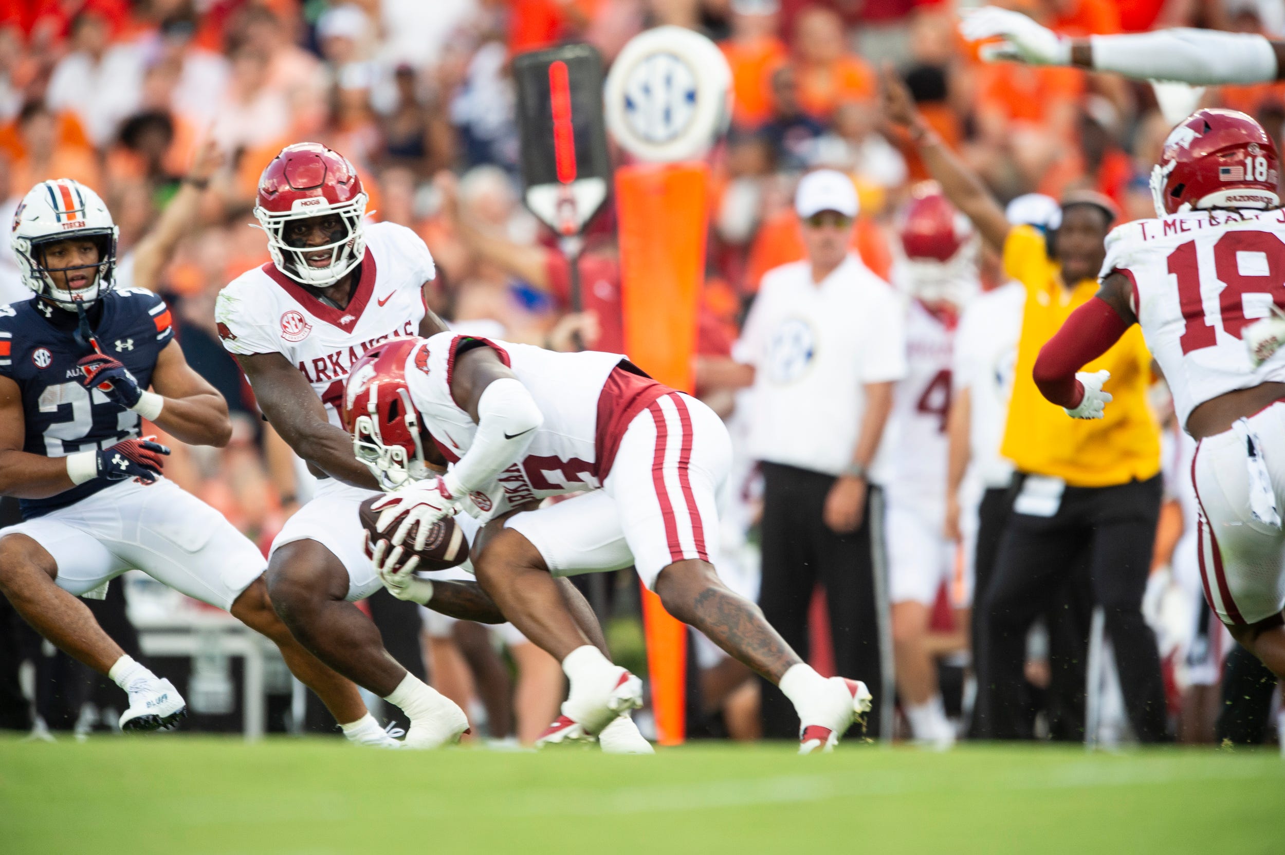 Arkansas Razorbacks defensive back Doneiko Slaughter (3) intercepts a tipped pass as Auburn Tigers take on Arkansas Razorbacks at Jordan-Hare Stadium in Auburn, Ala., on Saturday, Sept. 21, 2024. Arkansas Razorbacks lead Auburn Tigers 7-0 at halftime.