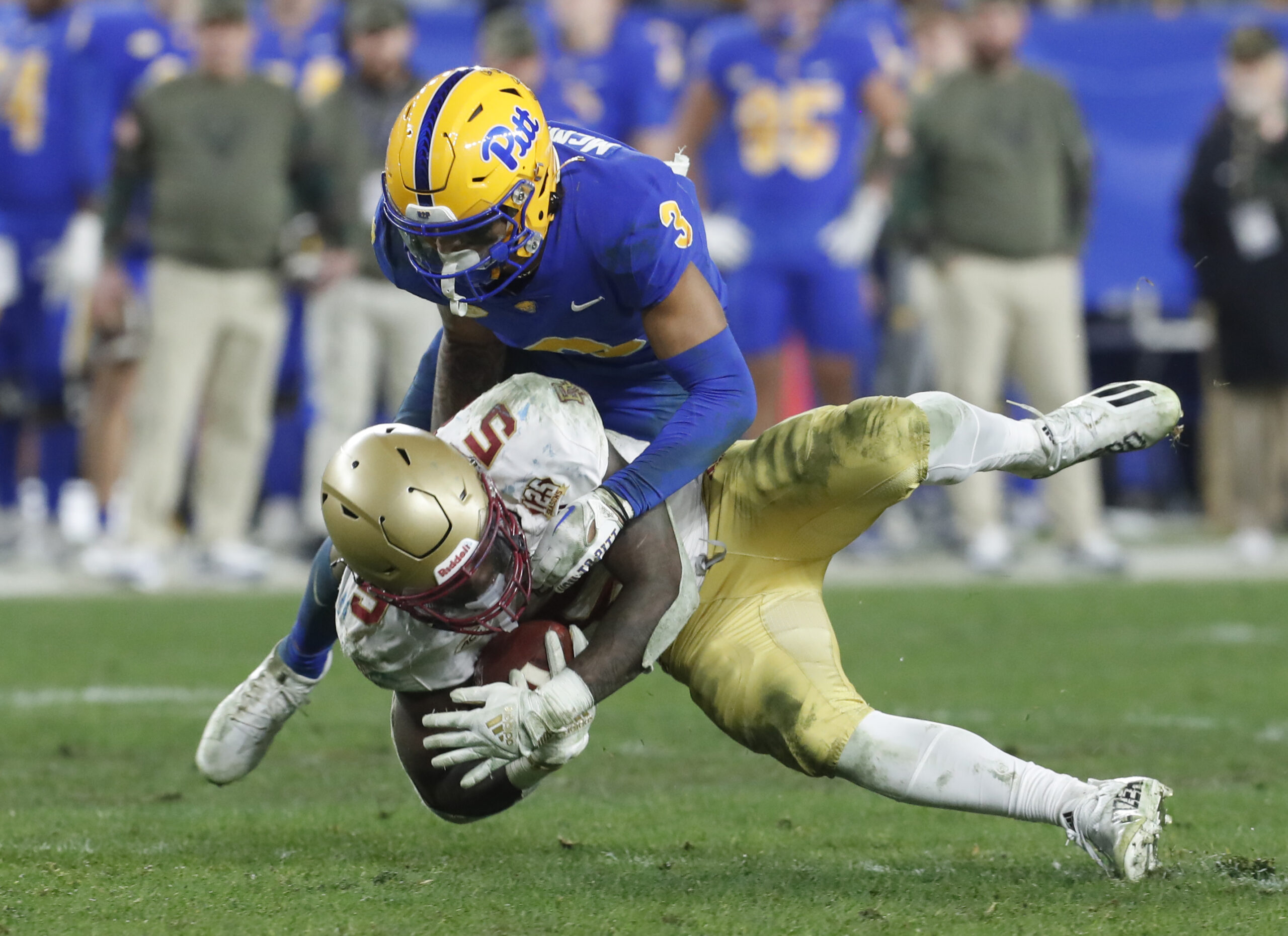 Nov 16, 2023; Pittsburgh, Pennsylvania, USA; Pittsburgh Panthers defensive back Donovan McMillon (3) tackles Boston College Eagles running back Kye Robichaux (5) during the fourth quarter at Acrisure Stadium. Pittsburgh won 24-16.