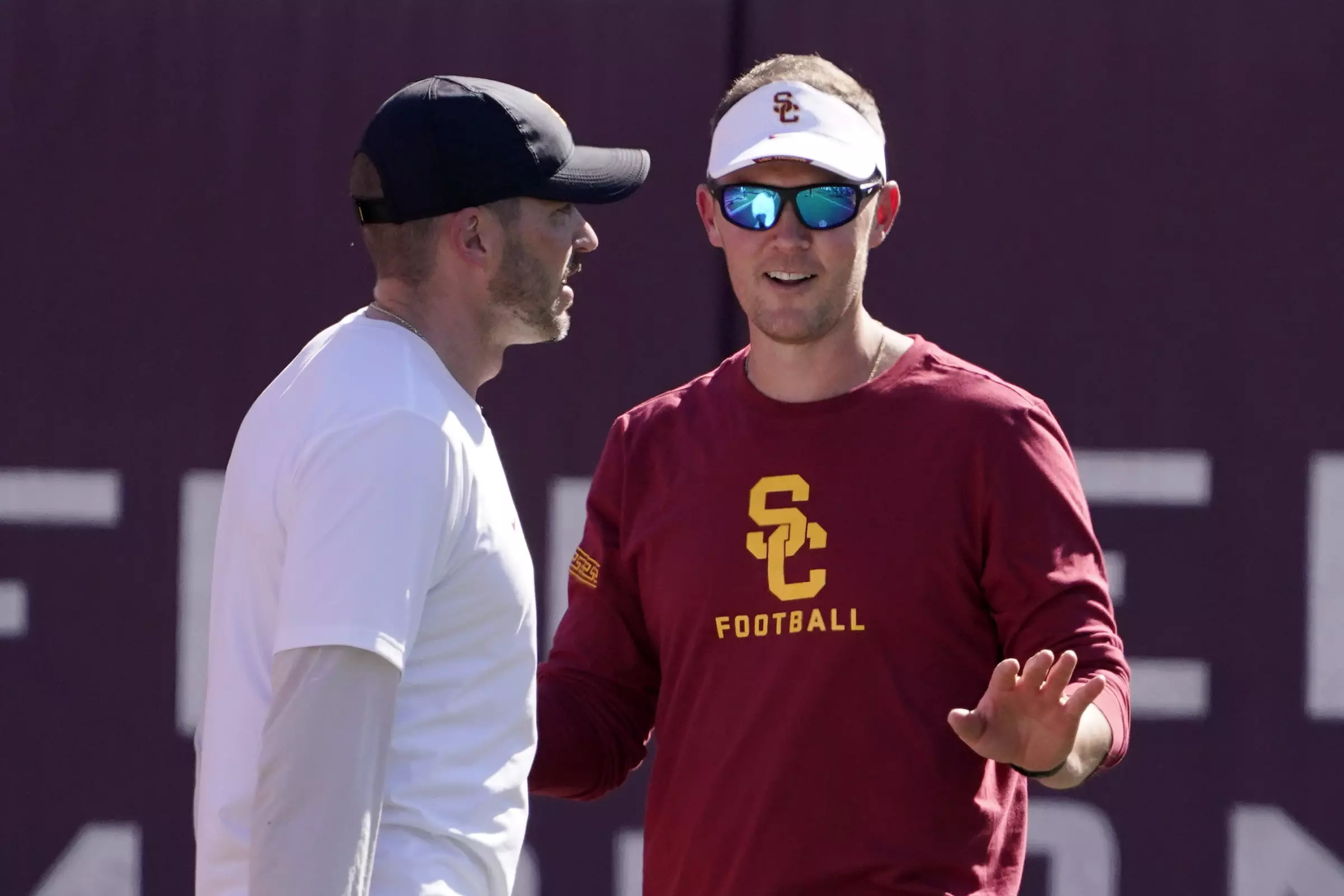 USC defensive coordinator Alex Grinch, left, and coach Lincoln Riley are taking plenty of heat this fall for the Trojans’ lack of defense.