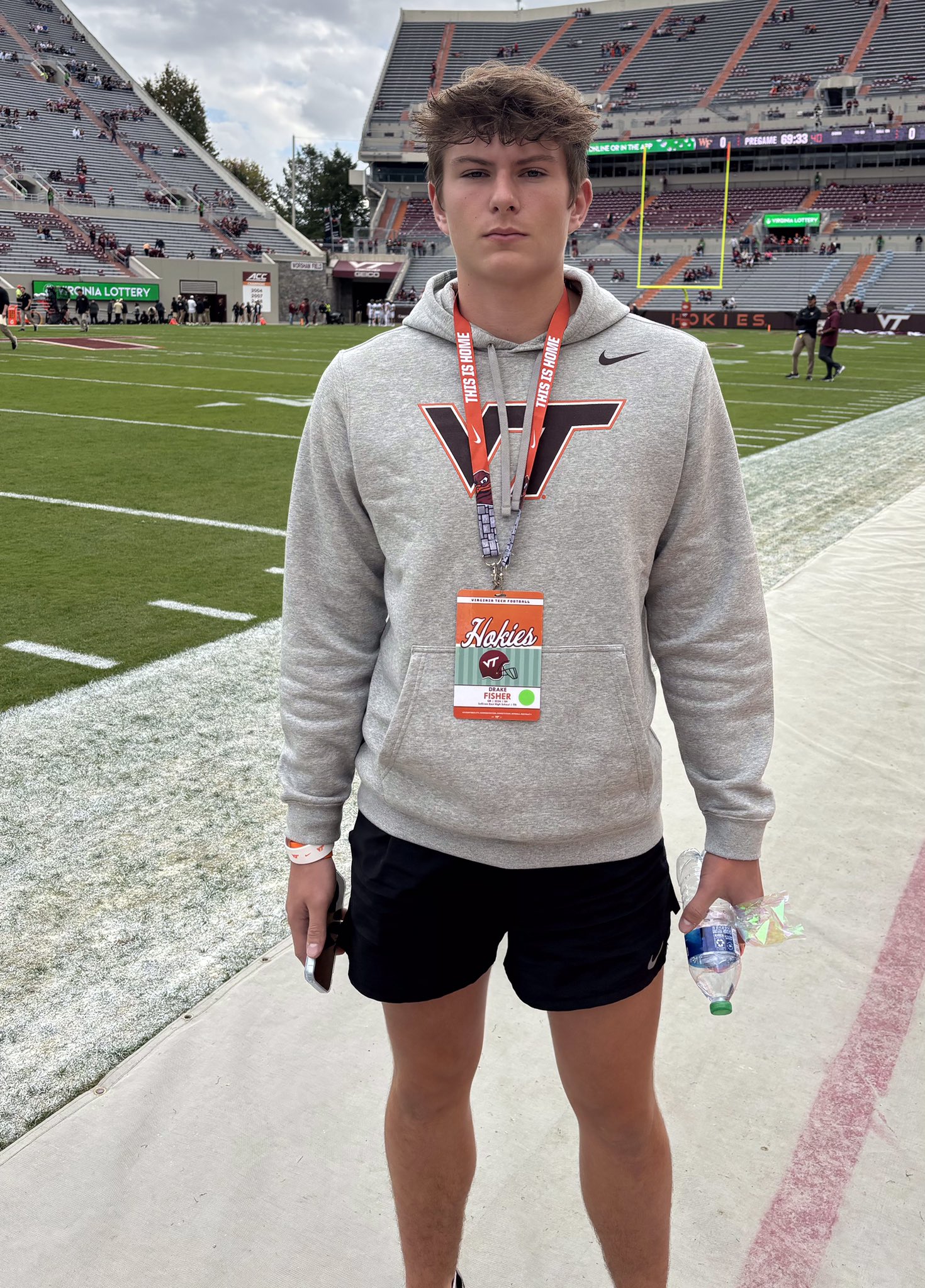 2024 3-Star QB Drake Fisher from Bluff City (Sullivan East), TN stands on the sideline during a game visit to Virginia Tech University
