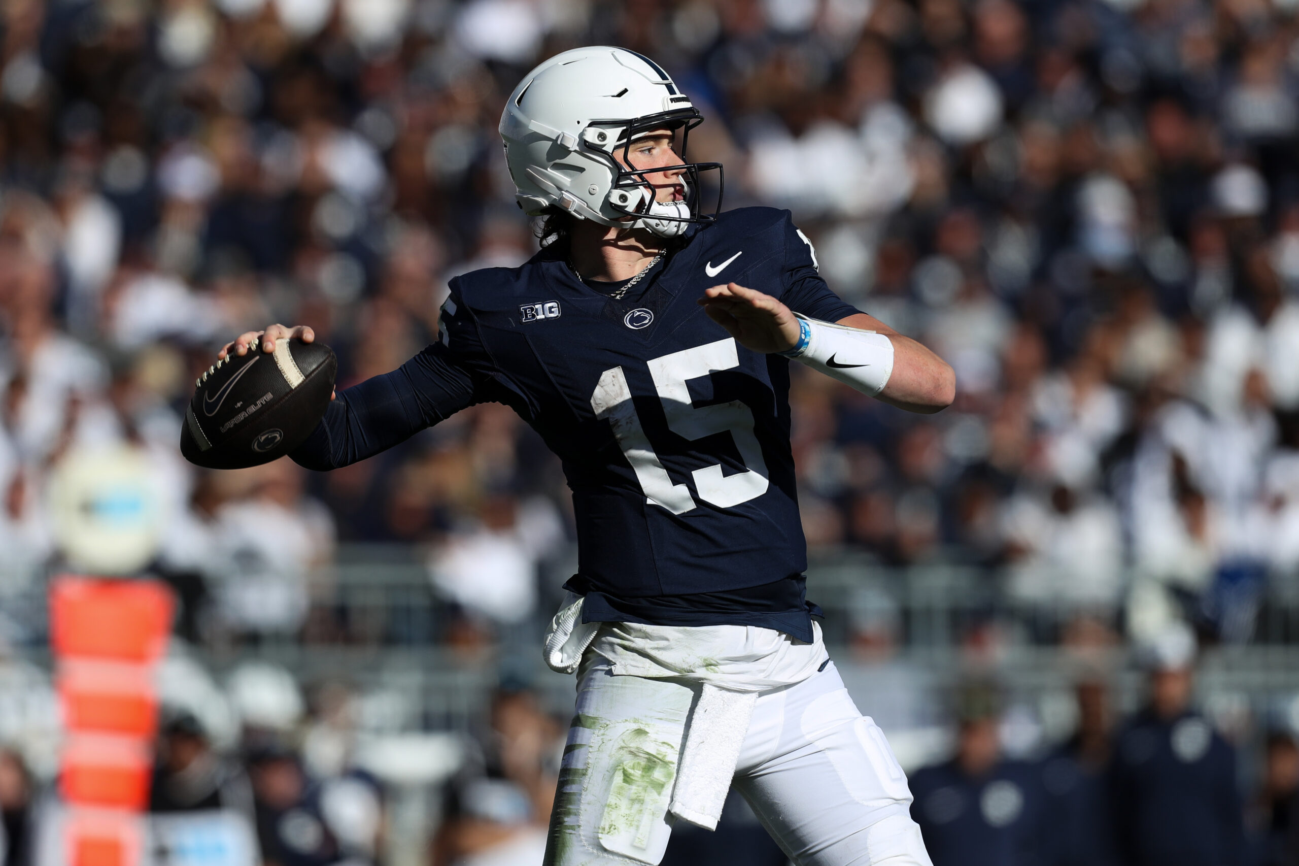 Oct 12, 2024; Los Angeles, California, USA; Penn State Nittany Lions quarterback Drew Allar (15) carries the ball for a short a short gain in the second at United Airlines Field at the Los Angeles Memorial Coliseum.