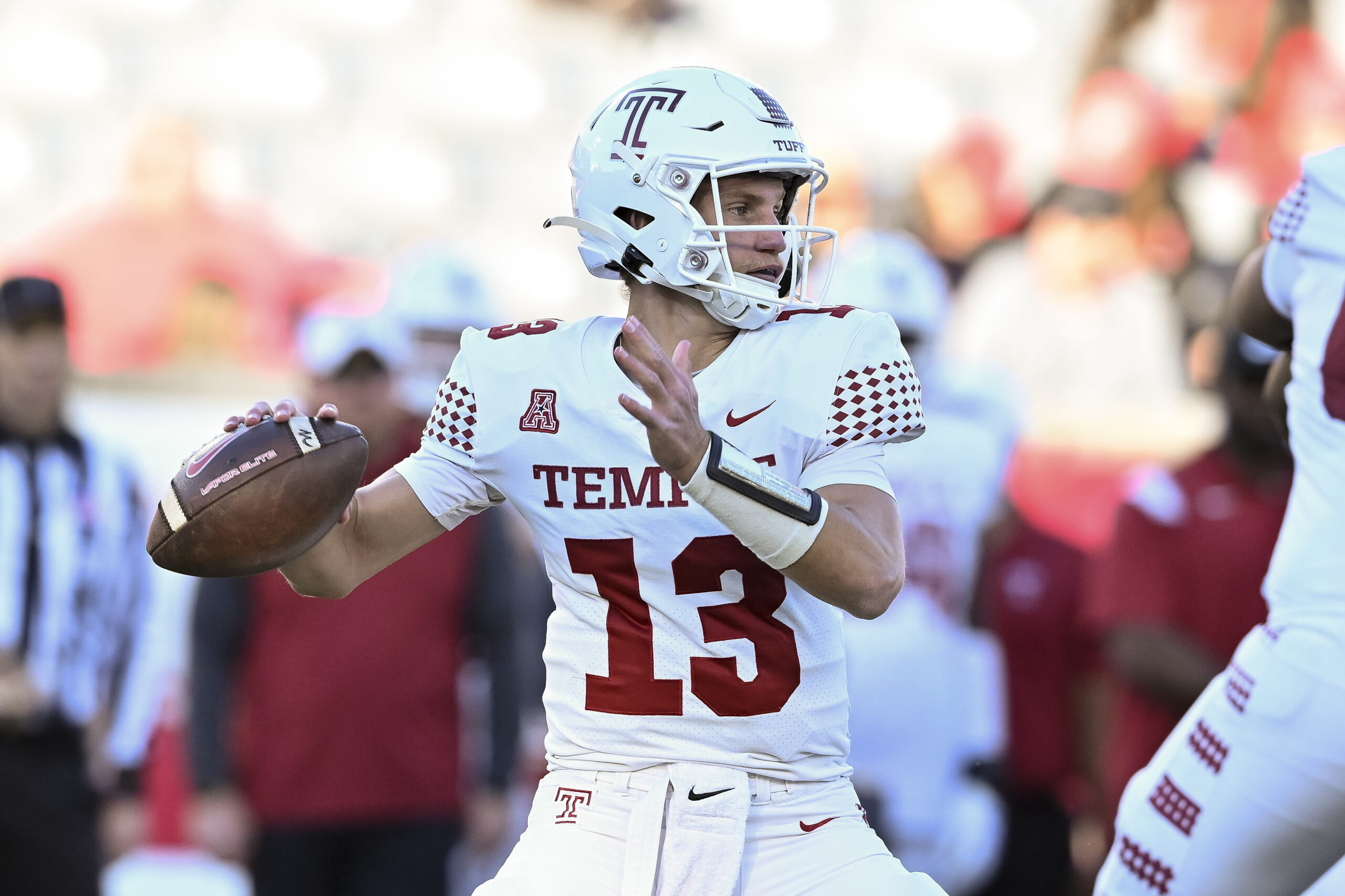 Nov 12, 2022; Houston, Texas, USA; Temple Owls quarterback E.J. Warner (13) throws a pass during the third quarter against the Houston Cougars at TDECU Stadium.