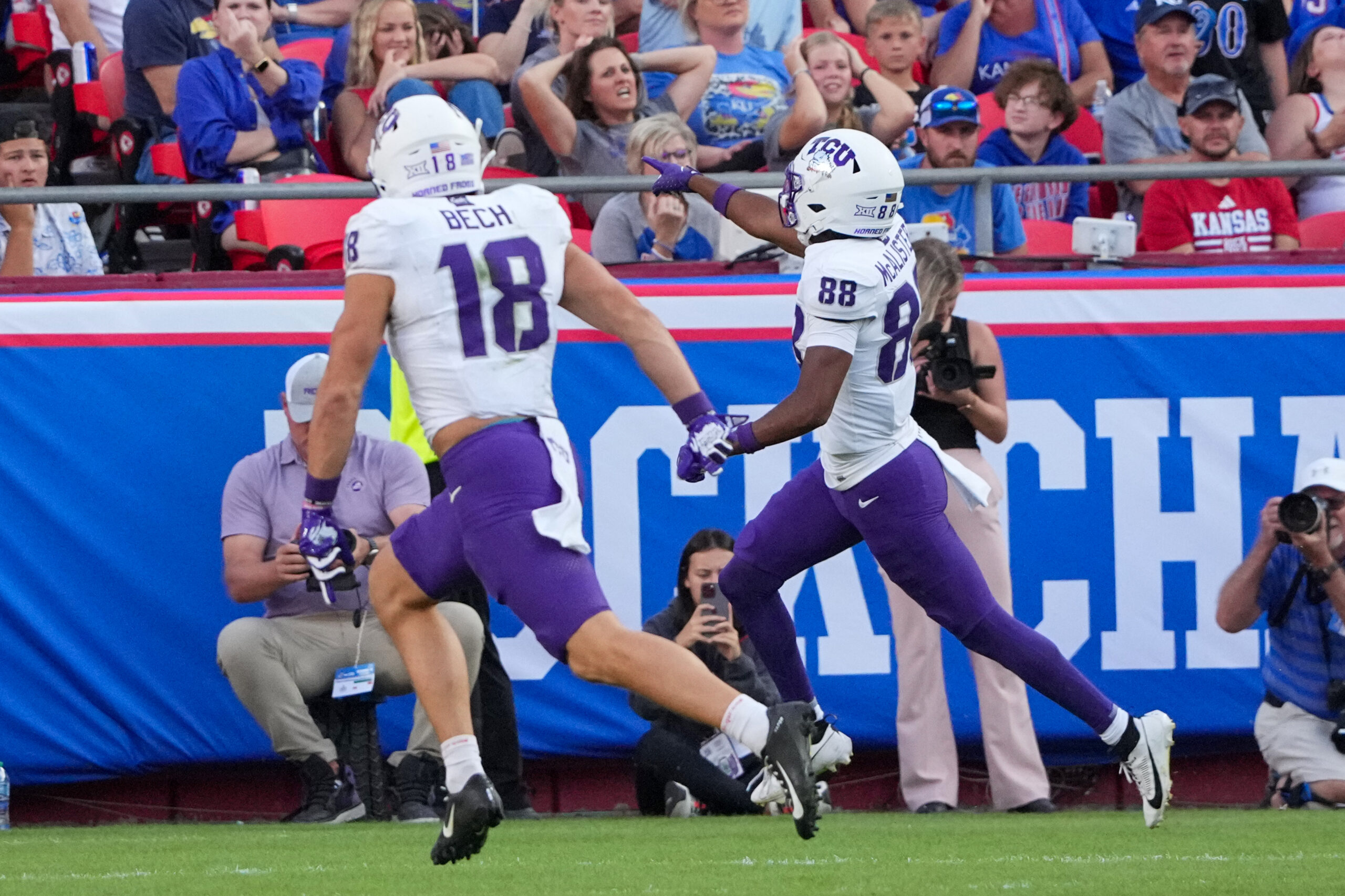 Sep 28, 2024; Kansas City, Missouri, USA; TCU Horned Frogs wide receiver Eric McAlister (88) celebrates toward fans after scoring against the Kansas Jayhawks during the second half at GEHA Field at Arrowhead Stadium. 